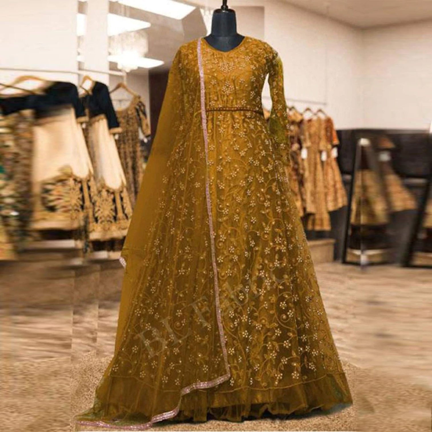 Yellow Gown with Heavy Embroidery and Stone work
