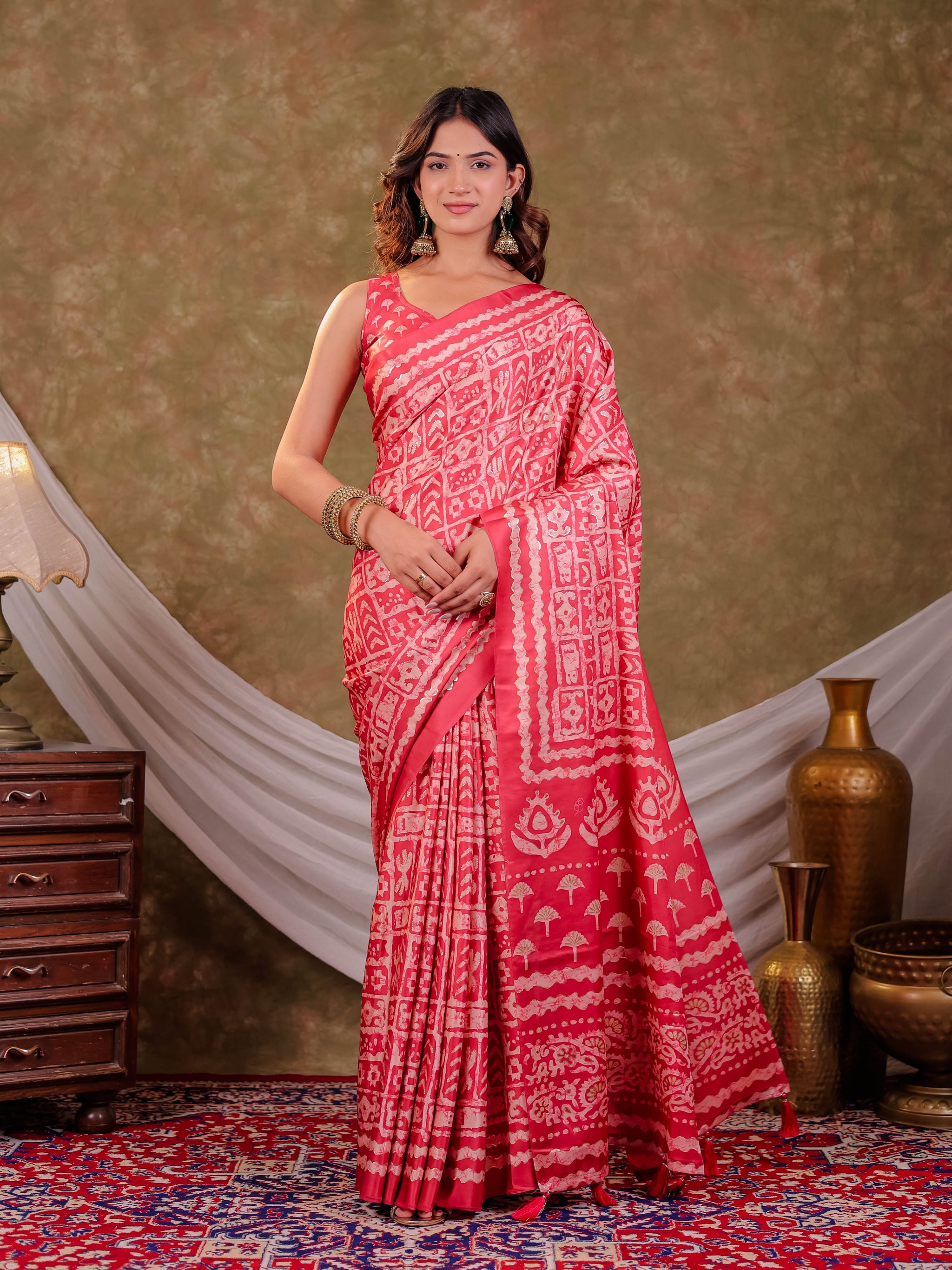 Coral Pink Pure Chinnon Batik Printed Saree with Foil Detailing, Designer Border, Tassel Edges & Matching Blouse Piece