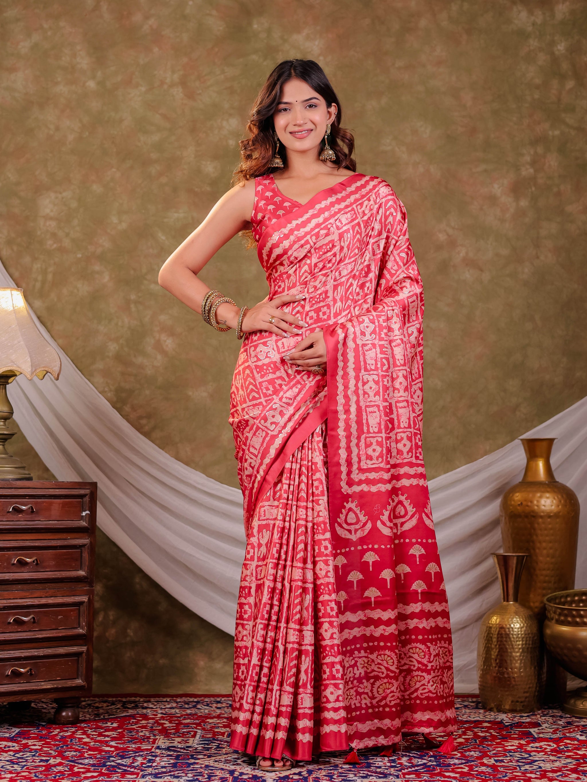 Coral Pink Pure Chinnon Batik Printed Saree with Foil Detailing, Designer Border, Tassel Edges & Matching Blouse Piece