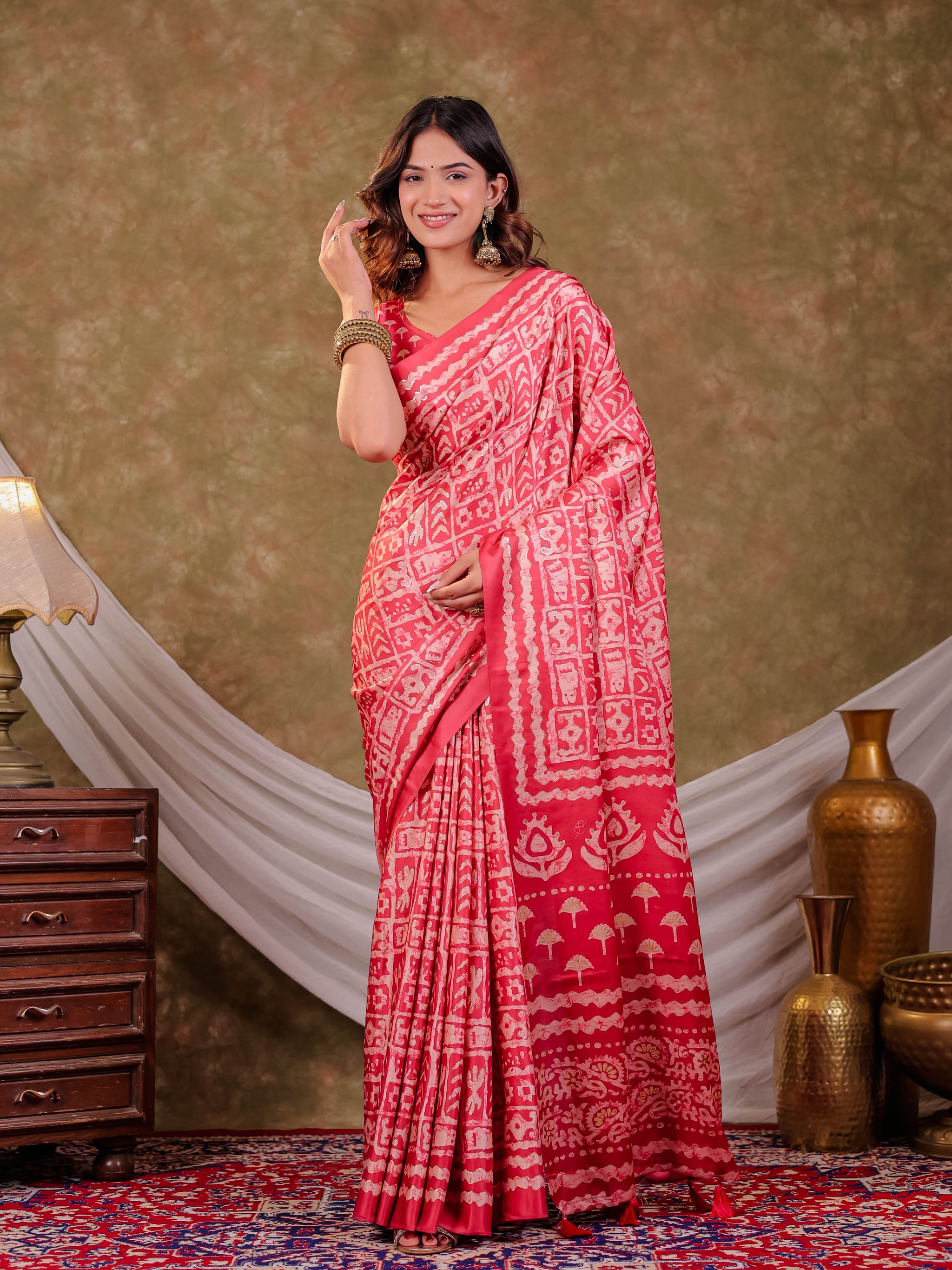 Coral Pink Pure Chinnon Batik Printed Saree with Foil Detailing, Designer Border, Tassel Edges & Matching Blouse Piece