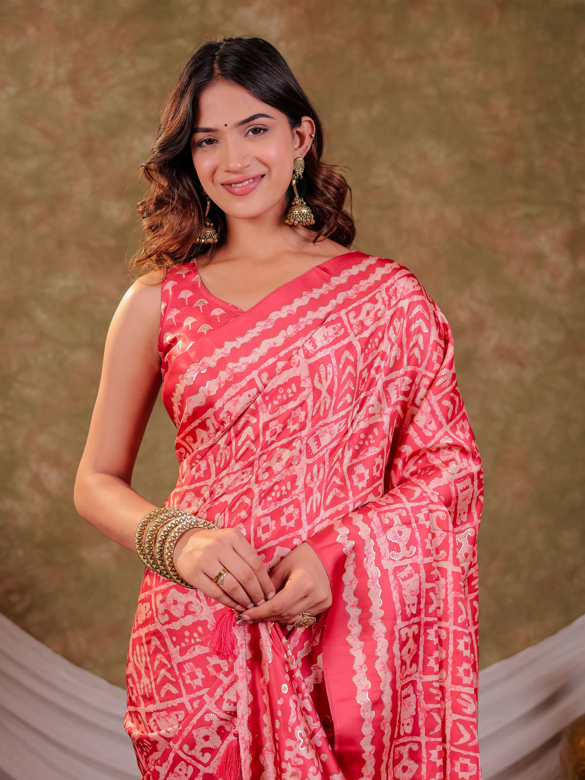Coral Pink Pure Chinnon Batik Printed Saree with Foil Detailing, Designer Border, Tassel Edges & Matching Blouse Piece