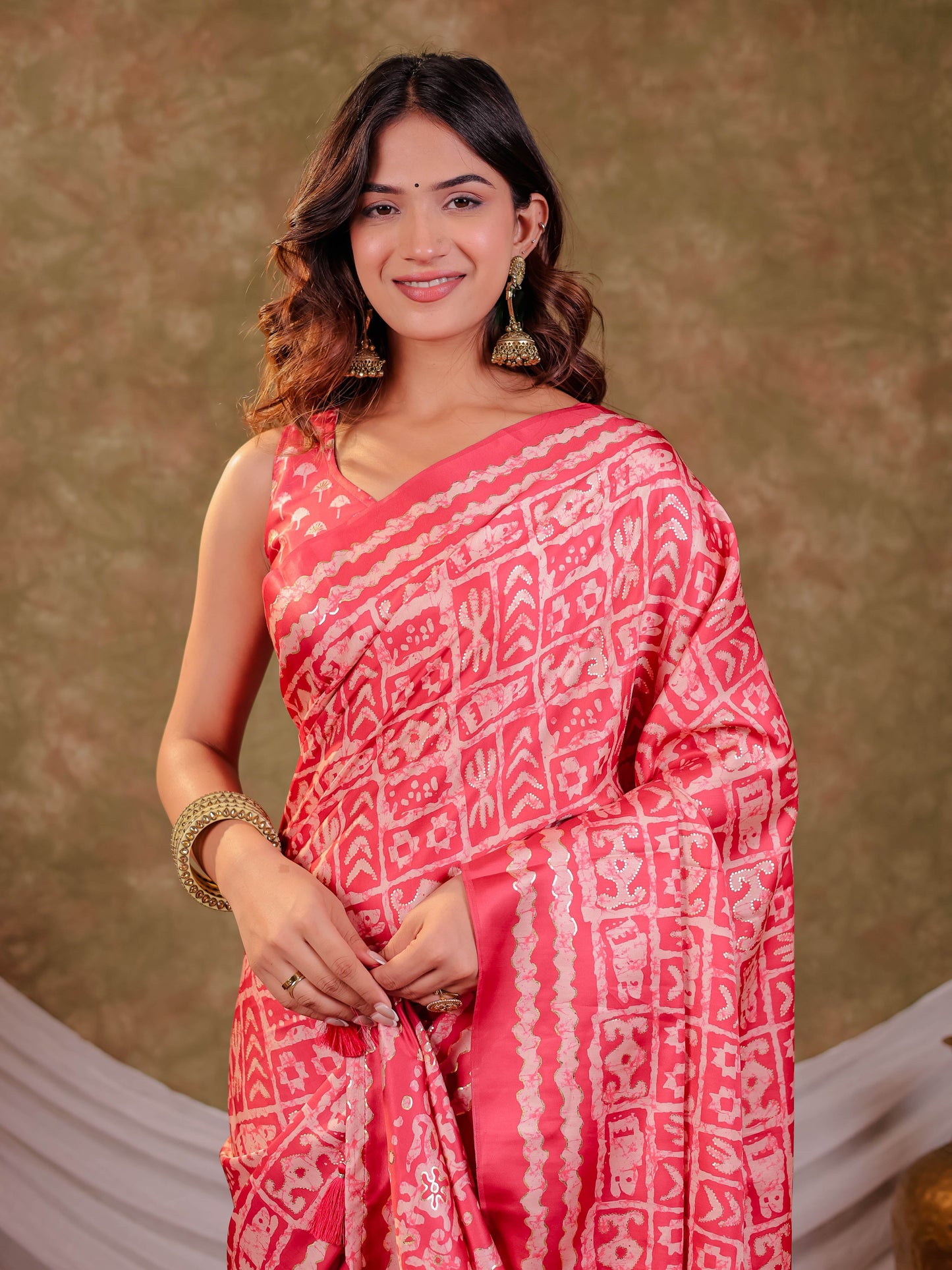 Coral Pink Pure Chinnon Batik Printed Saree with Foil Detailing, Designer Border, Tassel Edges & Matching Blouse Piece