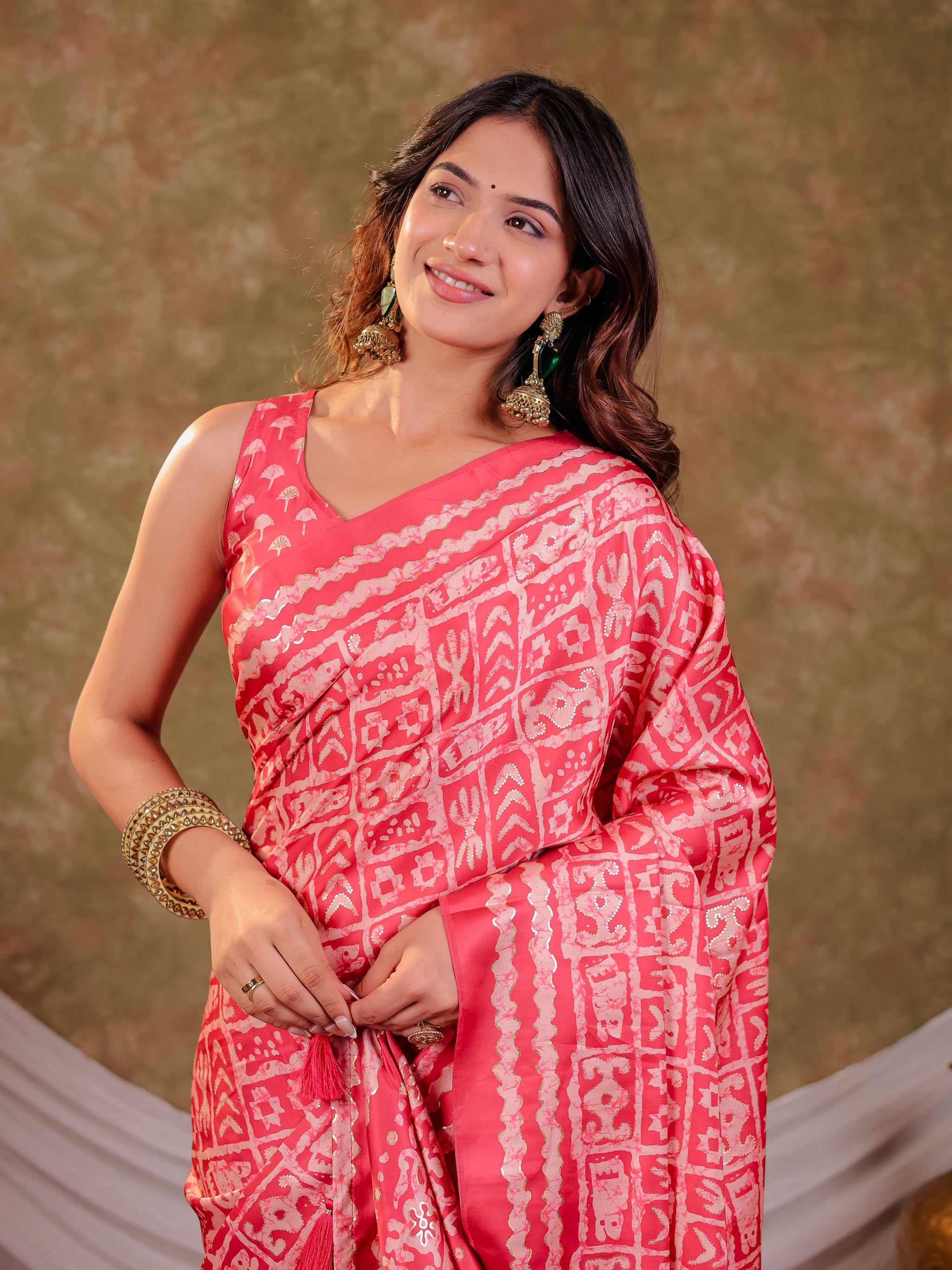 Coral Pink Pure Chinnon Batik Printed Saree with Foil Detailing, Designer Border, Tassel Edges & Matching Blouse Piece