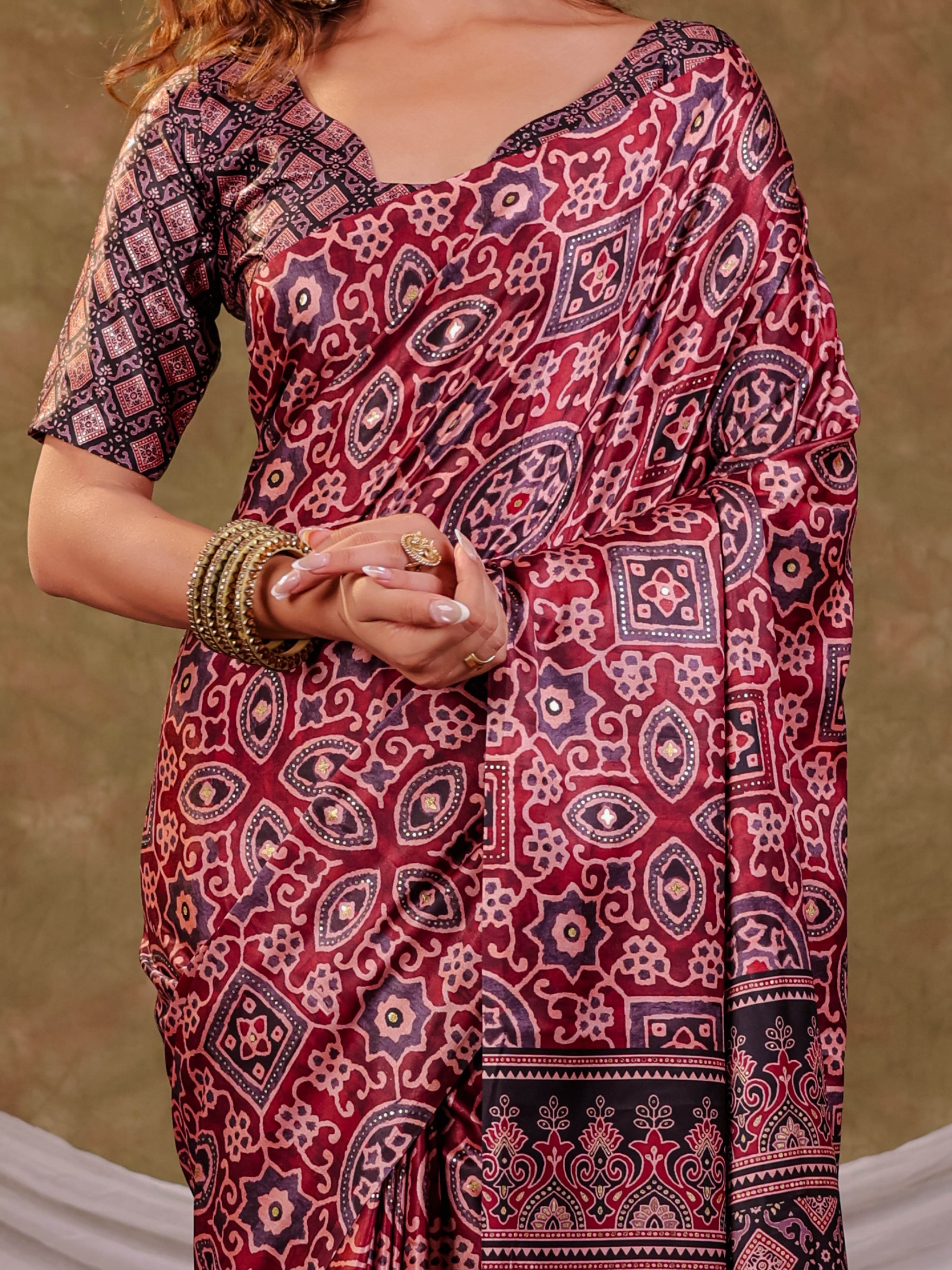 Wine Maroon Pure Chinnon Batik Printed Saree with Foil Detailing, Designer Border, Tassel Edges & Matching Blouse Piece