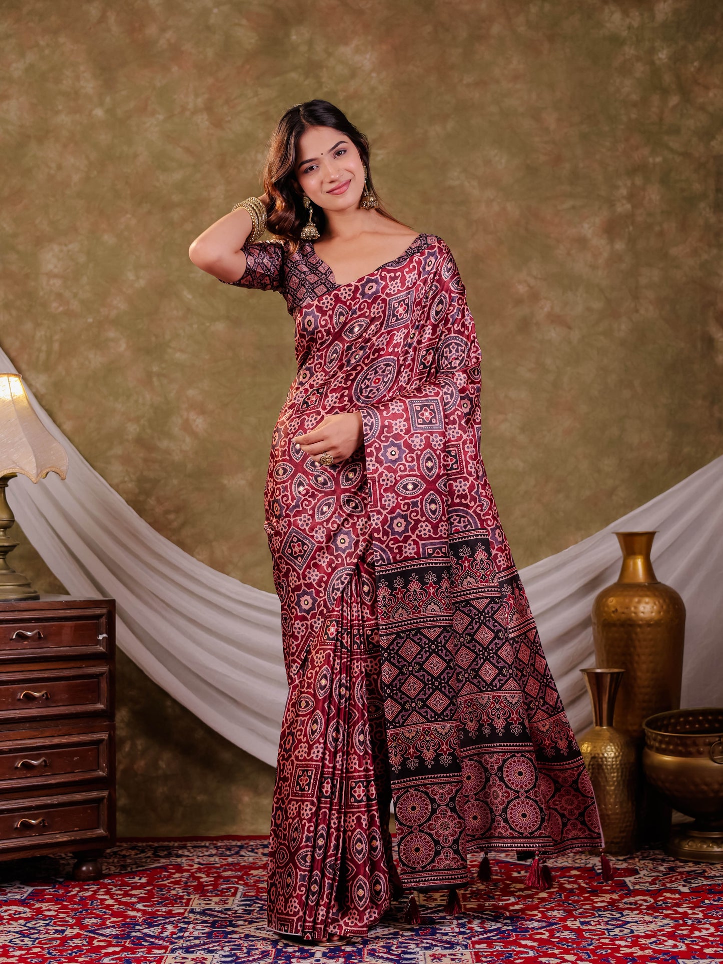 Wine Maroon Pure Chinnon Batik Printed Saree with Foil Detailing, Designer Border, Tassel Edges & Matching Blouse Piece