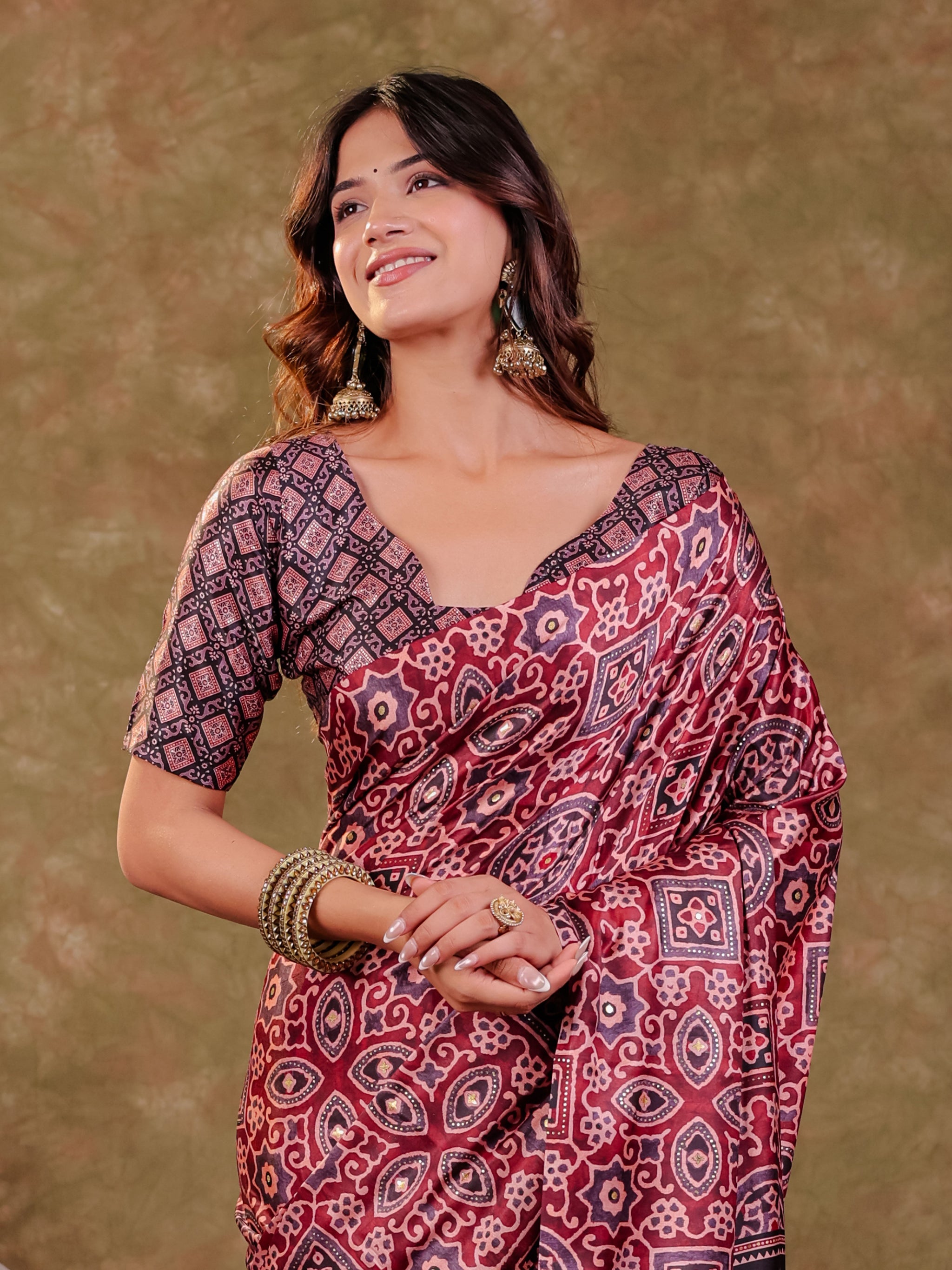 Wine Maroon Pure Chinnon Batik Printed Saree with Foil Detailing, Designer Border, Tassel Edges & Matching Blouse Piece