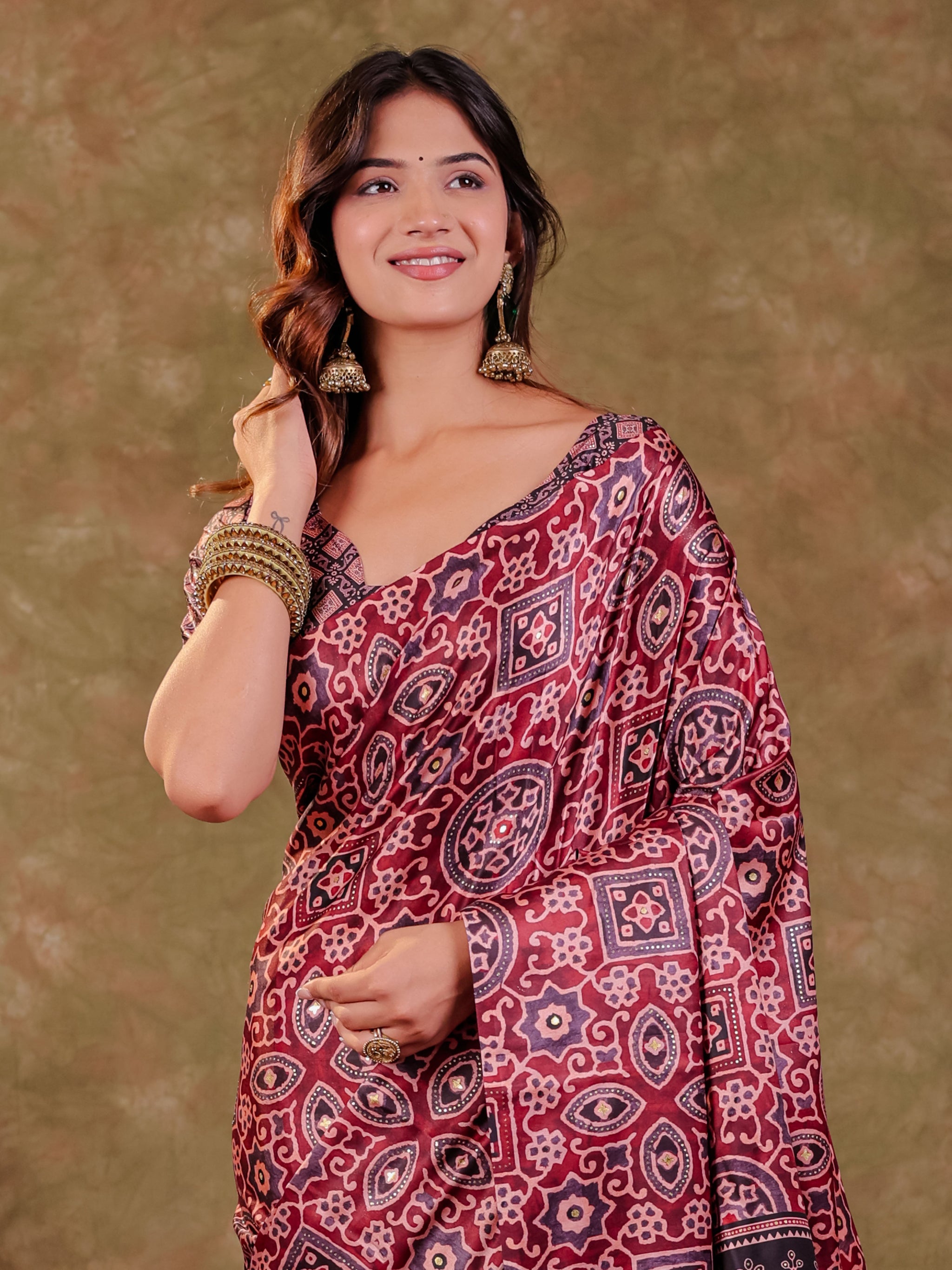 Wine Maroon Pure Chinnon Batik Printed Saree with Foil Detailing, Designer Border, Tassel Edges & Matching Blouse Piece