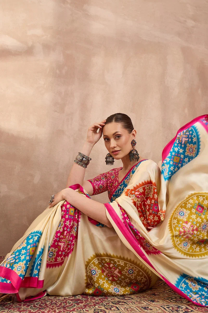 Cream modal silk saree with multicolor patola inspired print rani pink border designer festive wear saree