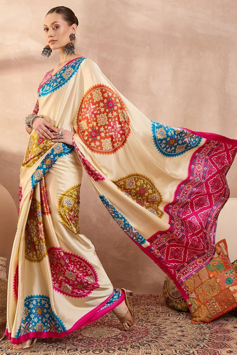 Cream modal silk saree with multicolor patola inspired print rani pink border designer festive wear saree