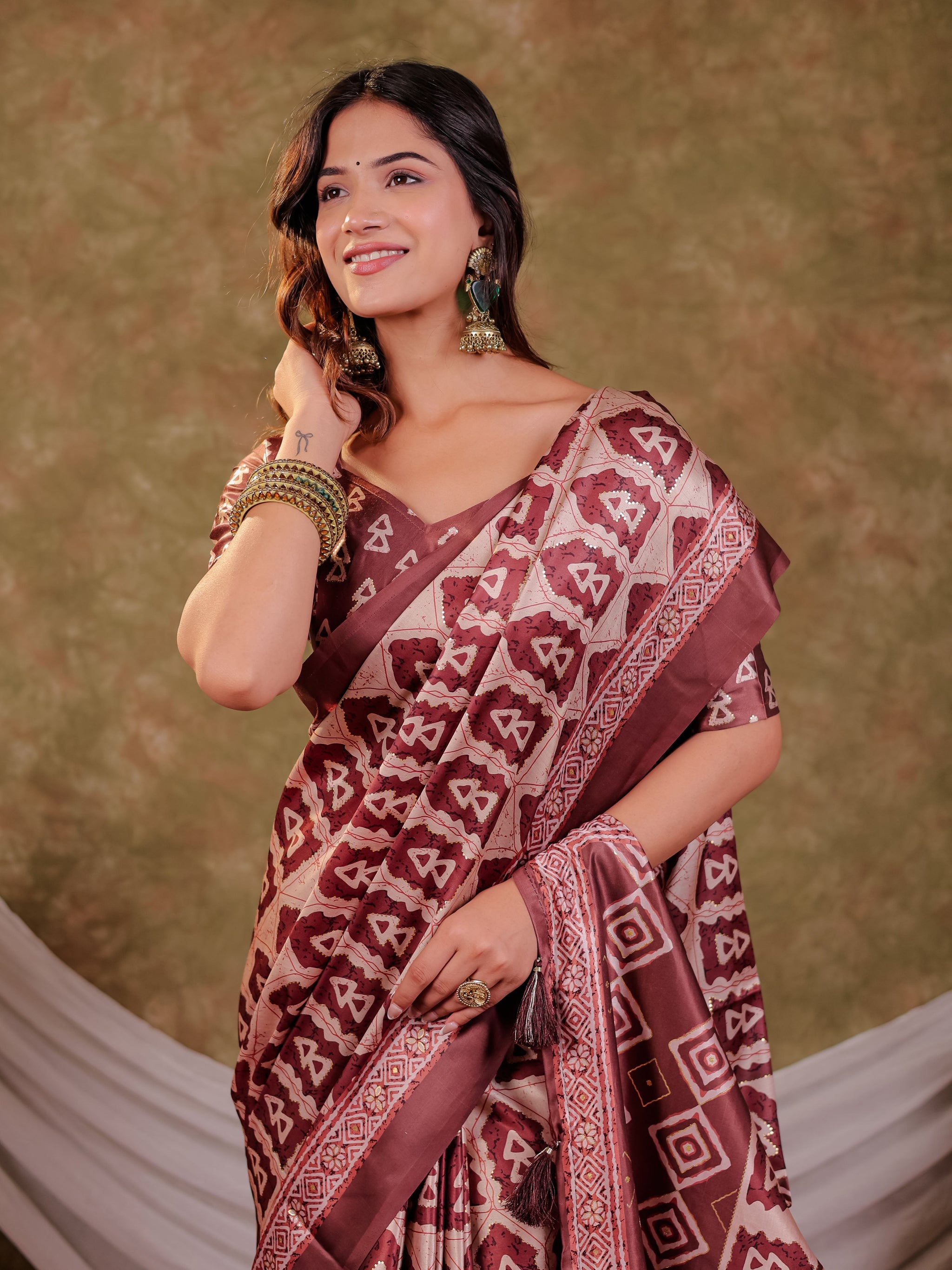 Coffee Brown Pure Chinnon Batik Printed Saree with Foil Detailing, Designer Border, Tassel Edges & Matching Blouse Piece