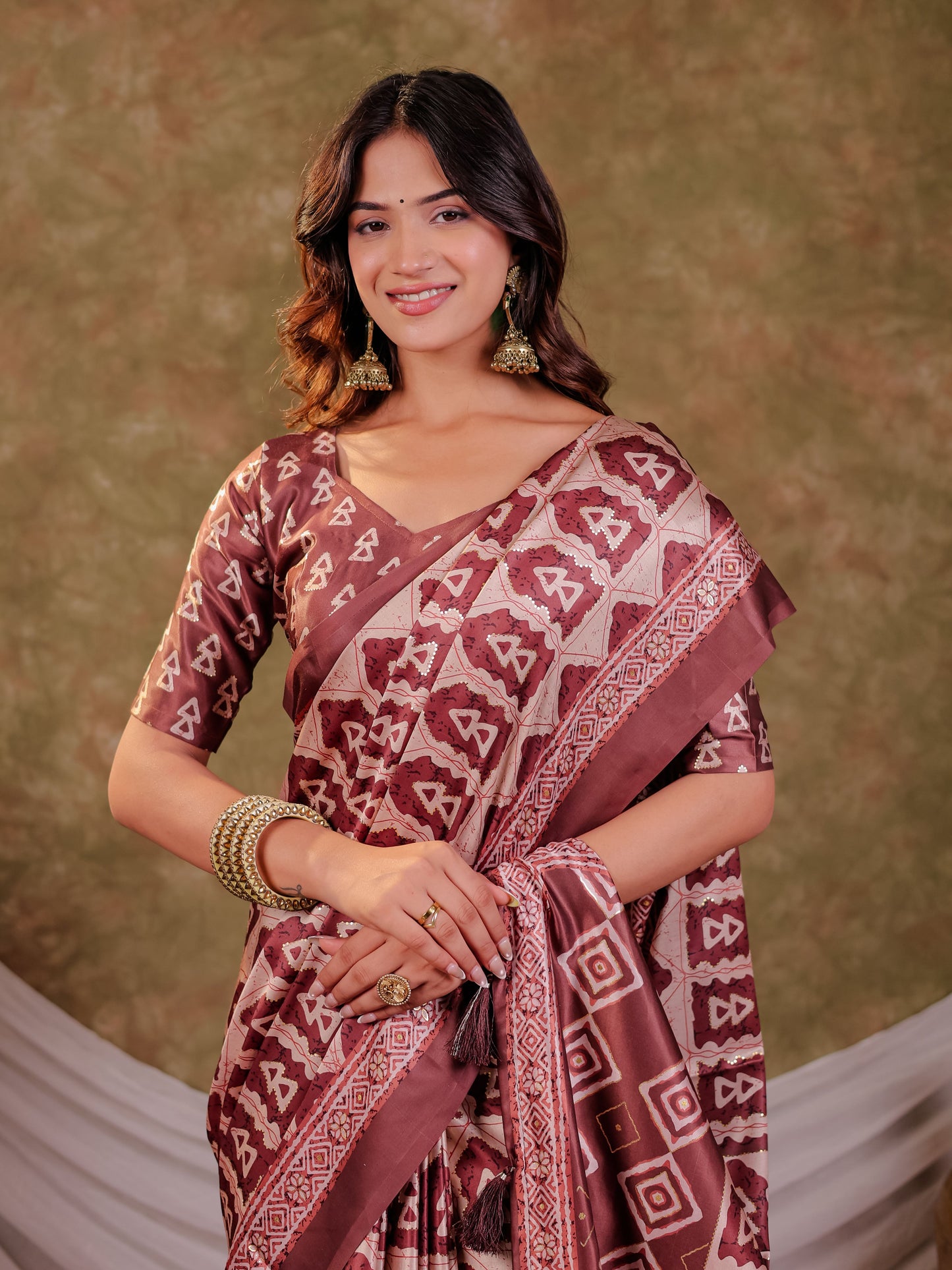 Coffee Brown Pure Chinnon Batik Printed Saree with Foil Detailing, Designer Border, Tassel Edges & Matching Blouse Piece