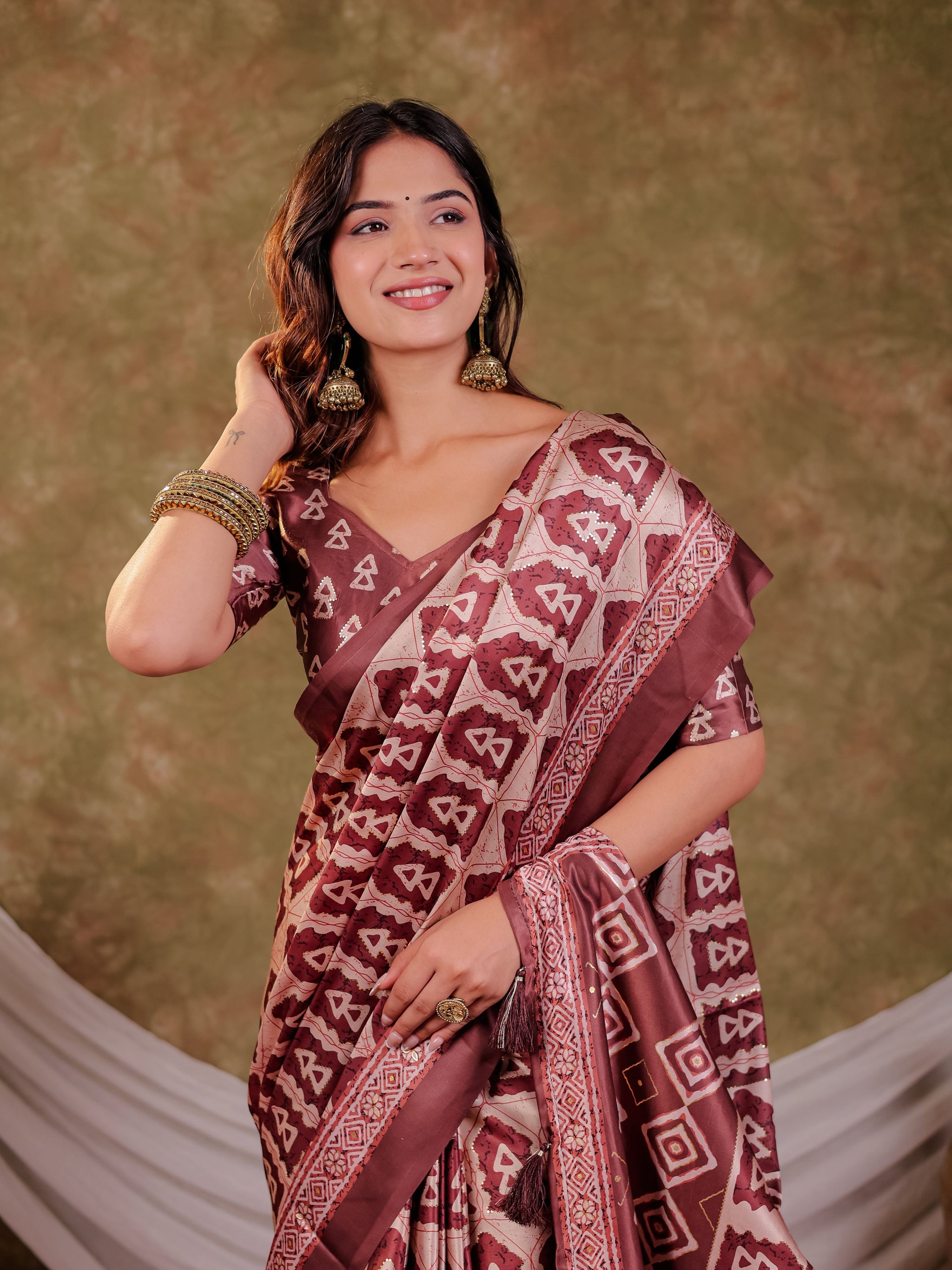 Coffee Brown Pure Chinnon Batik Printed Saree with Foil Detailing, Designer Border, Tassel Edges & Matching Blouse Piece