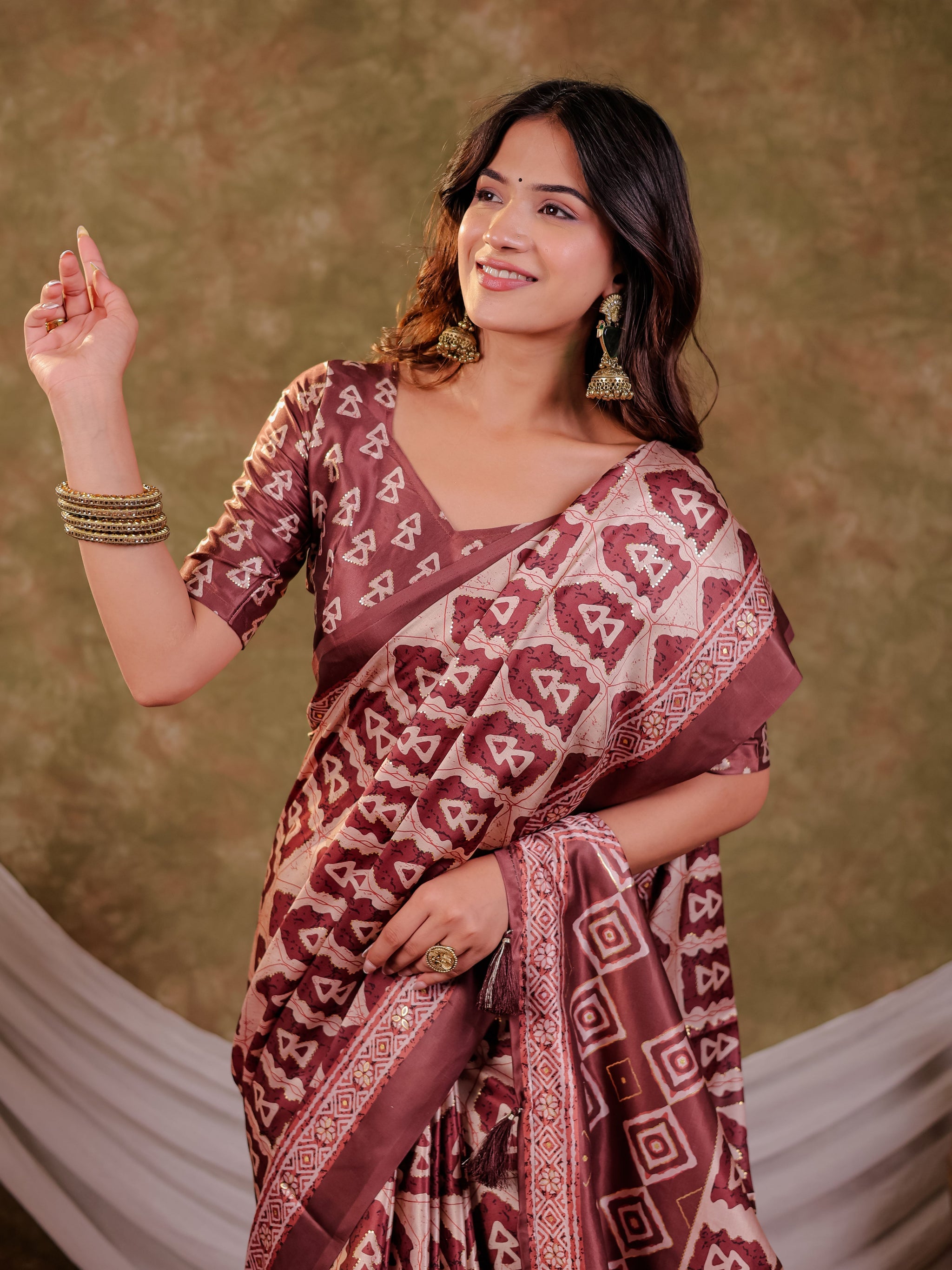 Coffee Brown Pure Chinnon Batik Printed Saree with Foil Detailing, Designer Border, Tassel Edges & Matching Blouse Piece