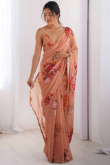 Partywear Peach Georgette Saree with Floral Prints and Bead Work Lace