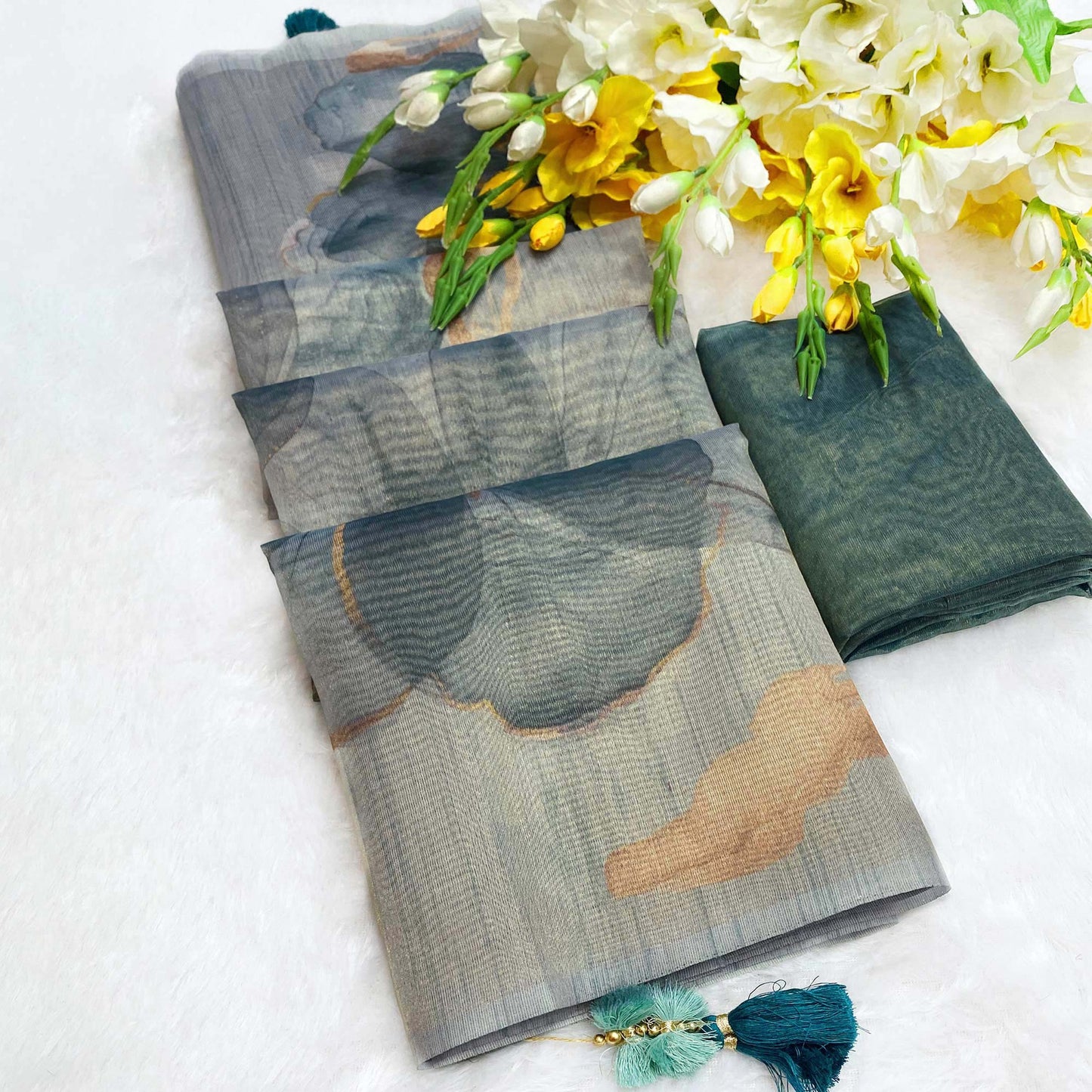 Sophisticated Blue Floral Digital Print Tissue Saree Enhanced With Handmade Tassels