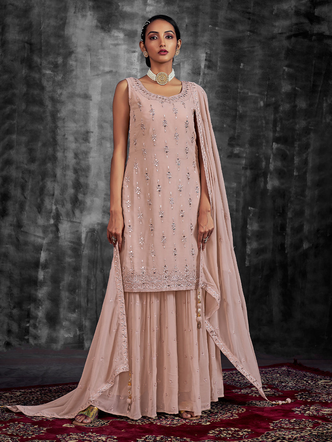 Beautiful Embroidered Peach Georgette Stitched Kurta Set