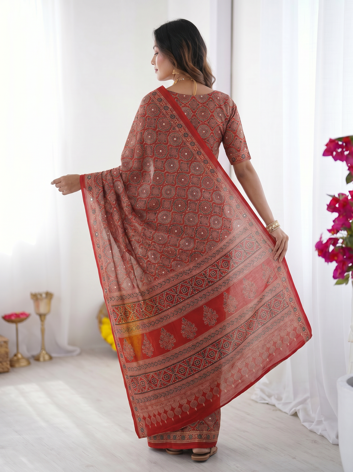 Rustic brick red modal silk saree with heritage geometric motifs traditional designer border artistic pallu