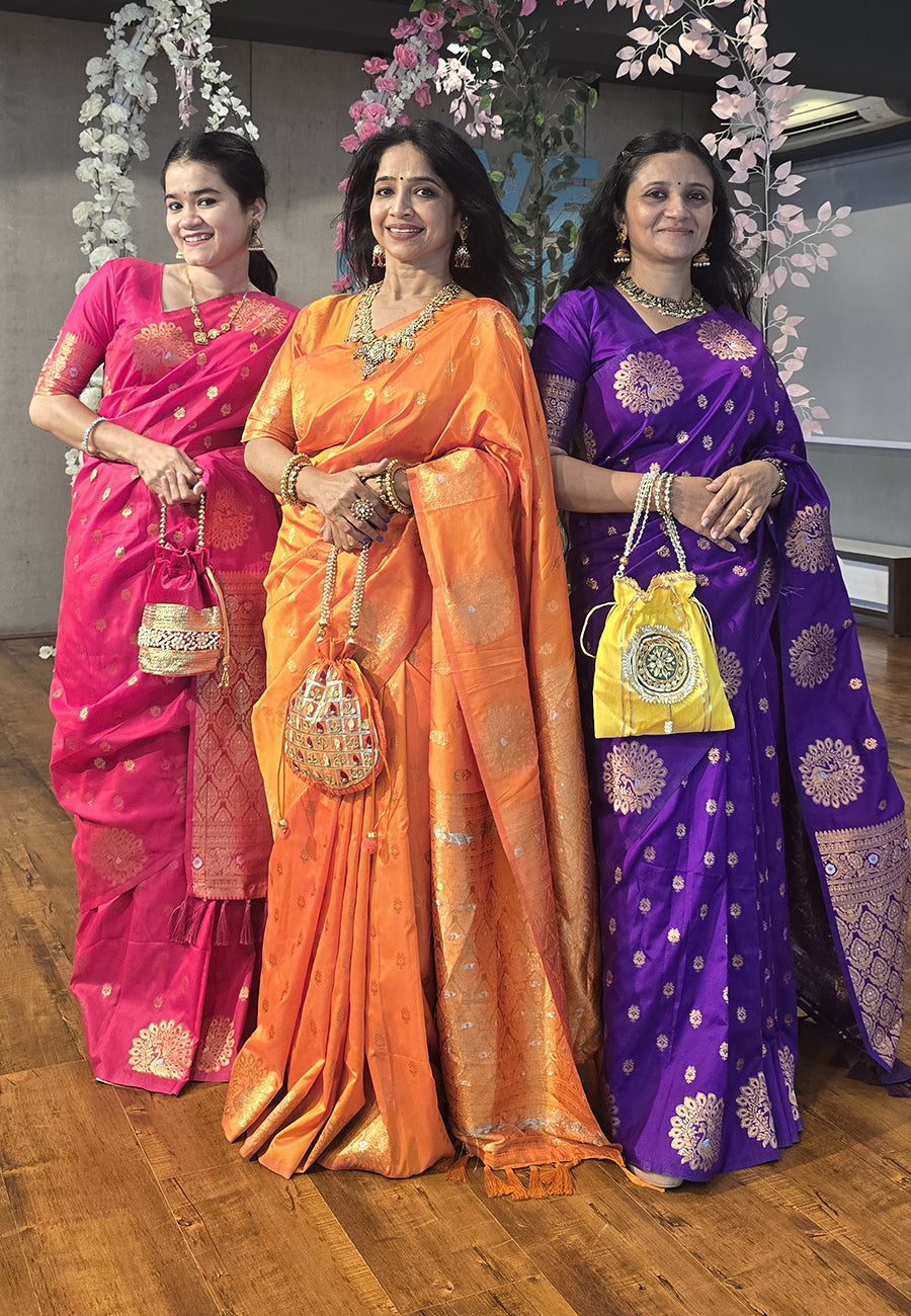 Pink soft silk dual zari woven saree with peacock border