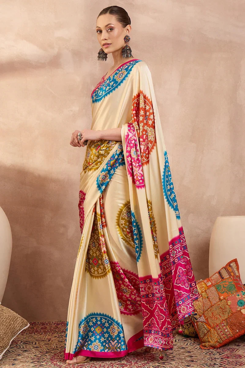 Cream modal silk saree with multicolor patola inspired print rani pink border designer festive wear saree