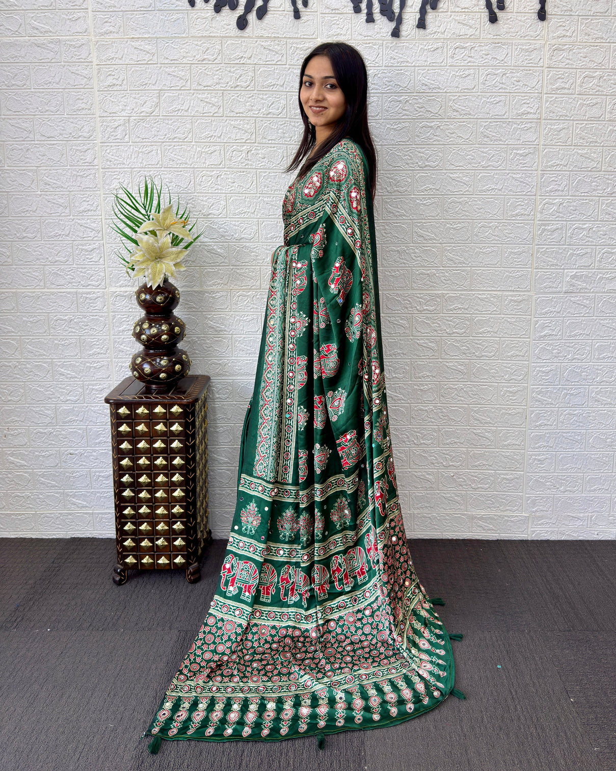 Forest green modal silk saree with elephant motif ajrakh print designer heritage pallu traditional festive wear saree