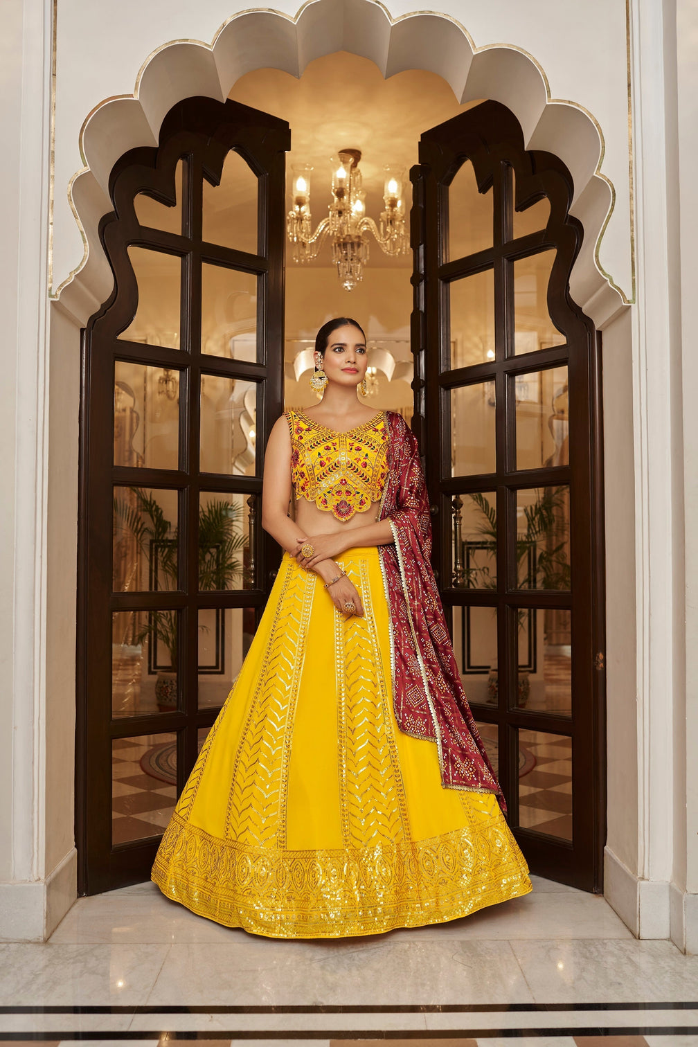 Yellow With Maroon Color Embroidered Semi Stitched Bridal Lehenga Choli