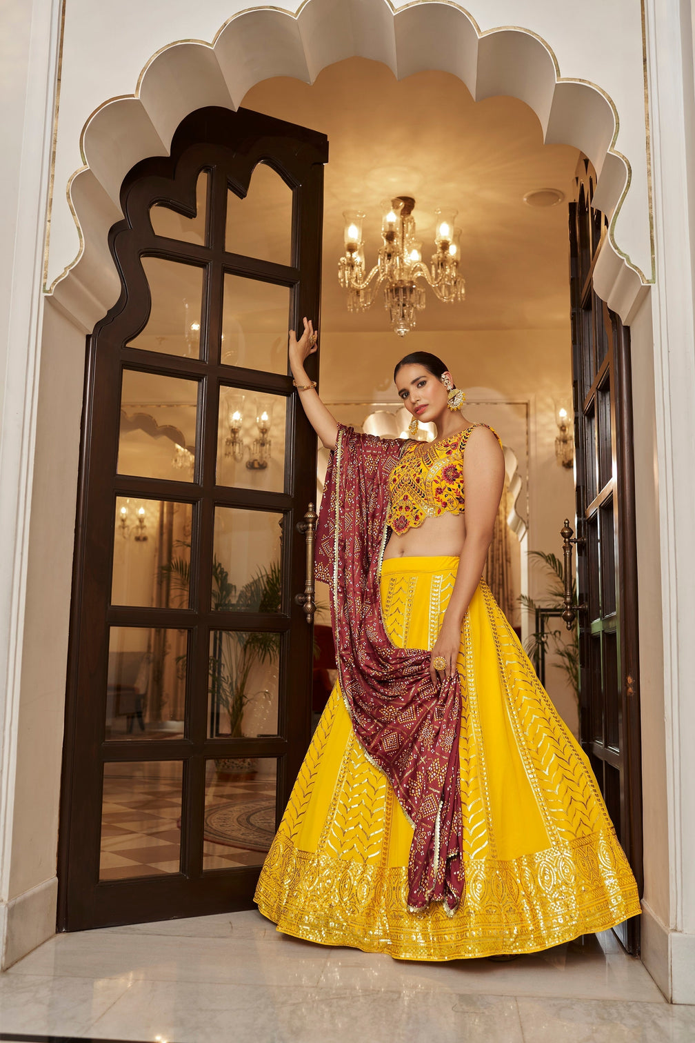 Yellow With Maroon Color Embroidered Semi Stitched Bridal Lehenga Choli