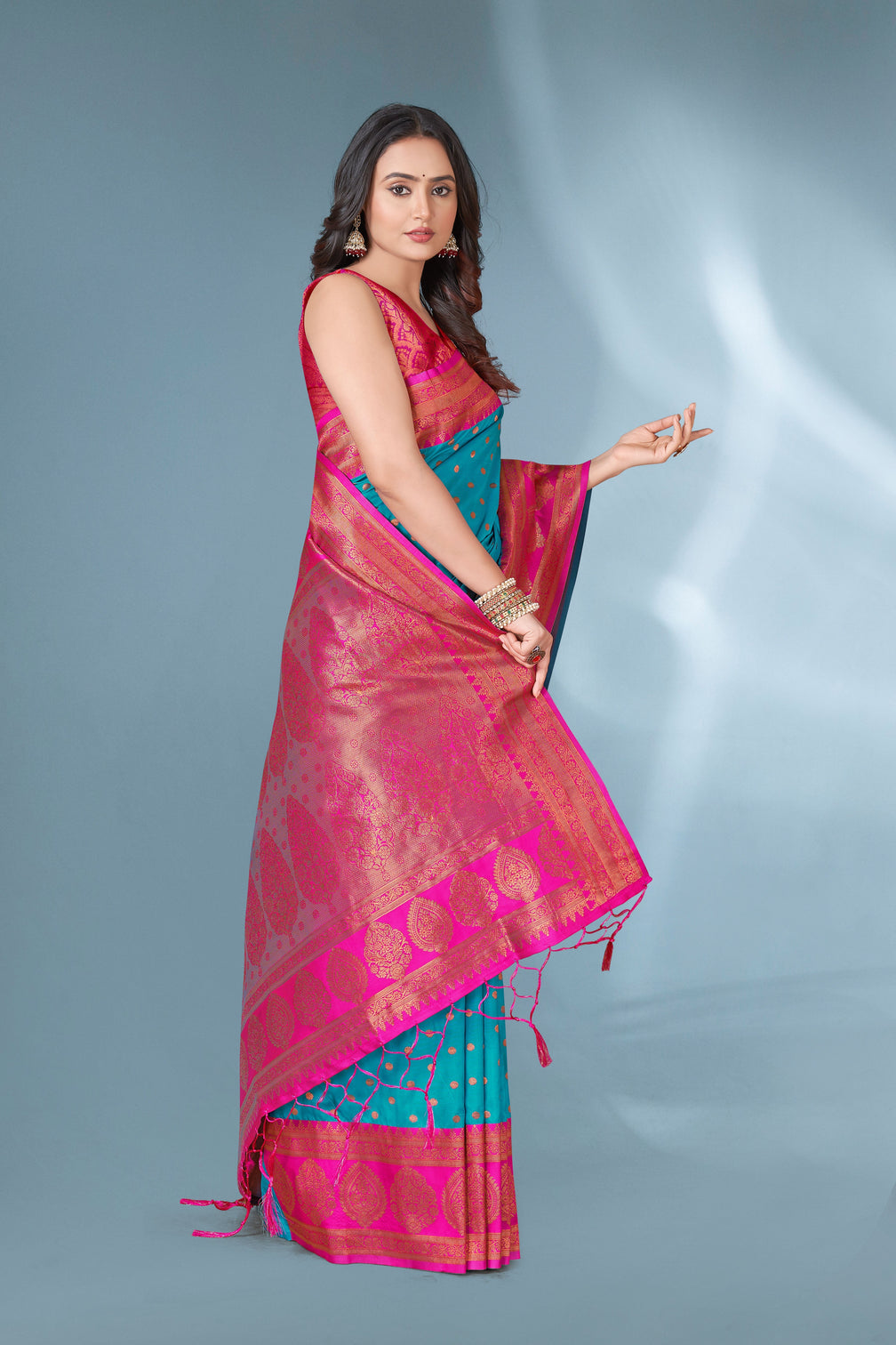 Blue polka paithani silk contrast zari woven saree with unstitched blouse