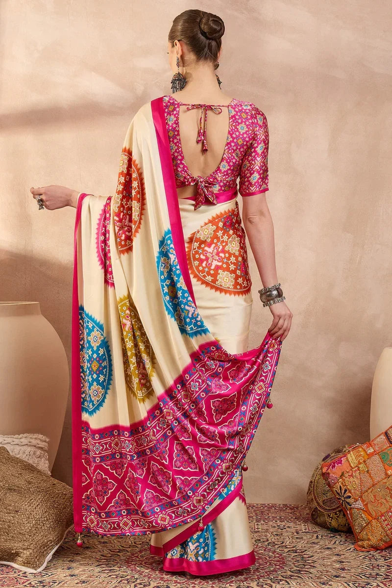 Cream modal silk saree with multicolor patola inspired print rani pink border designer festive wear saree