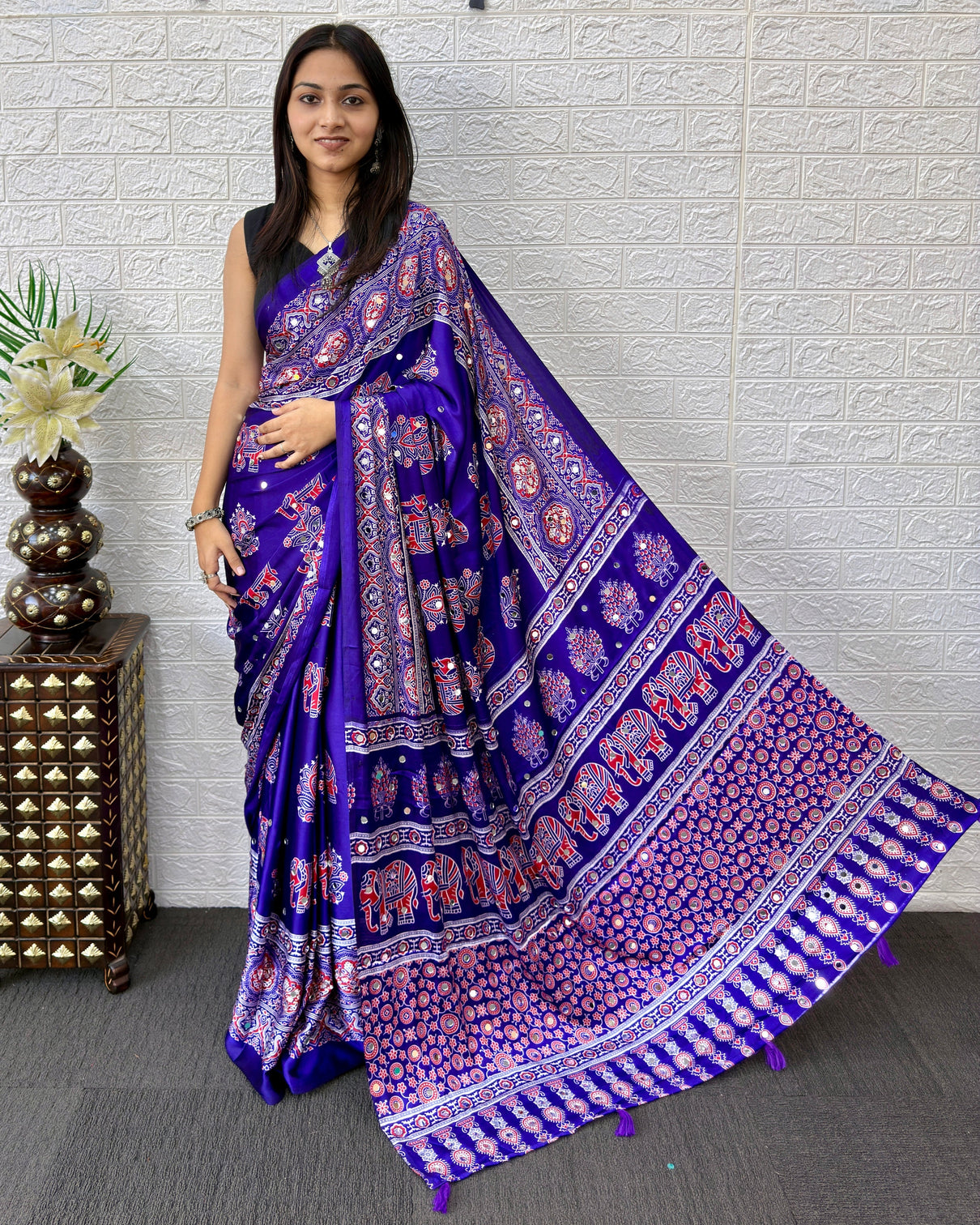 Royal purple modal silk ajrakh print saree with elephant motifs designer pallu tassels festive ethnic wear saree mameraa