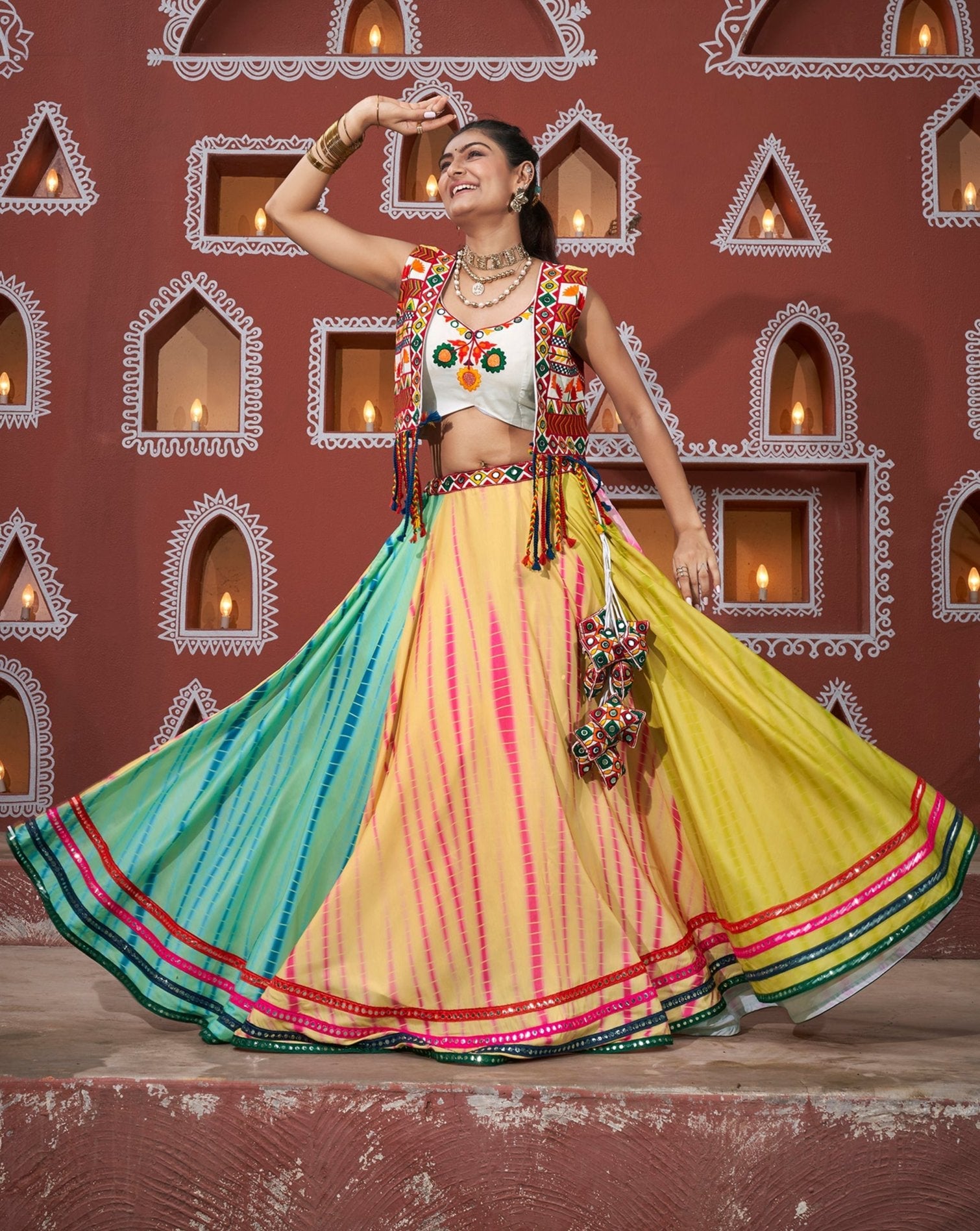 Multi Colour Embroidered Mirror Worked Navratri Jacket Lehenga Set