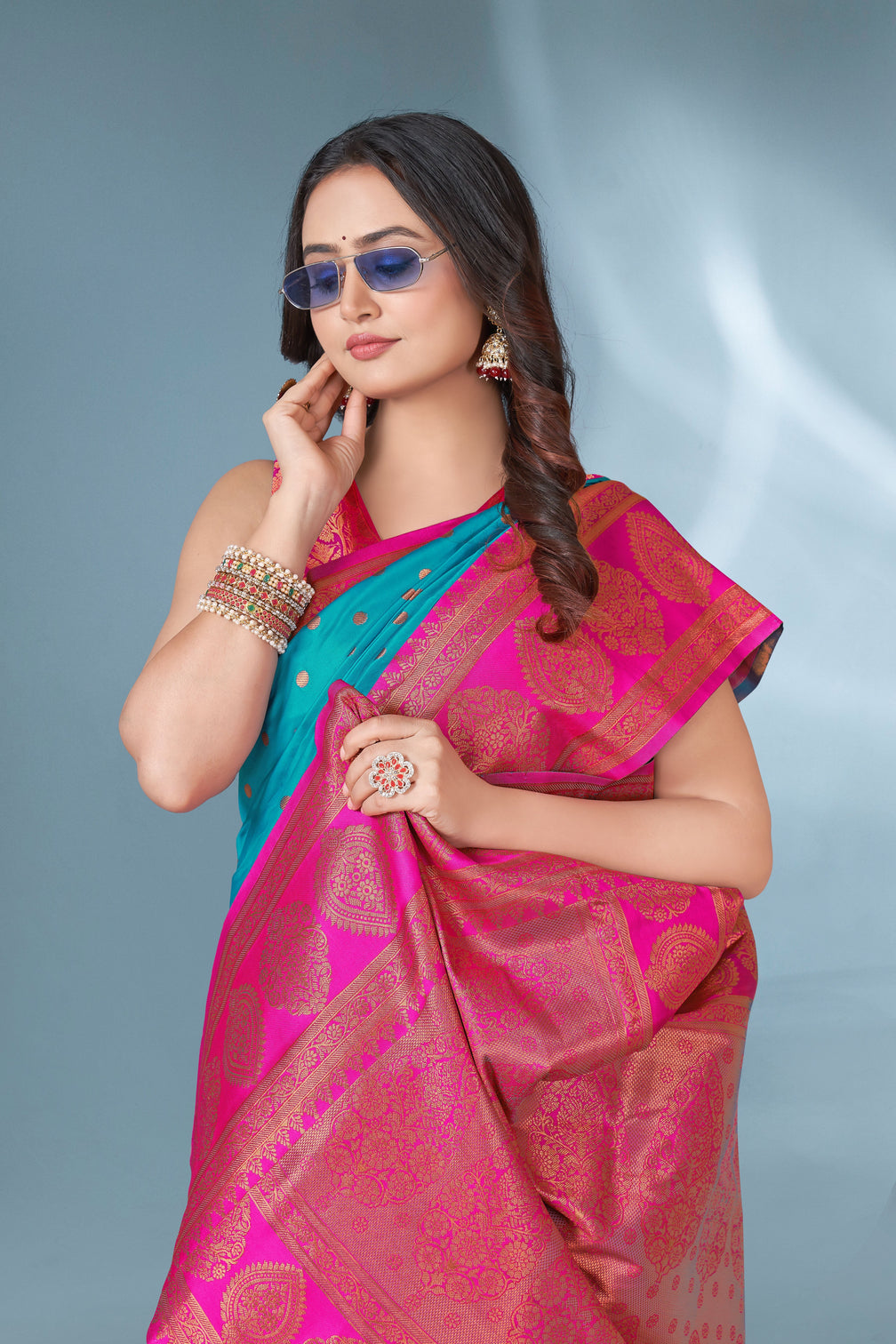Blue polka paithani silk contrast zari woven saree with unstitched blouse