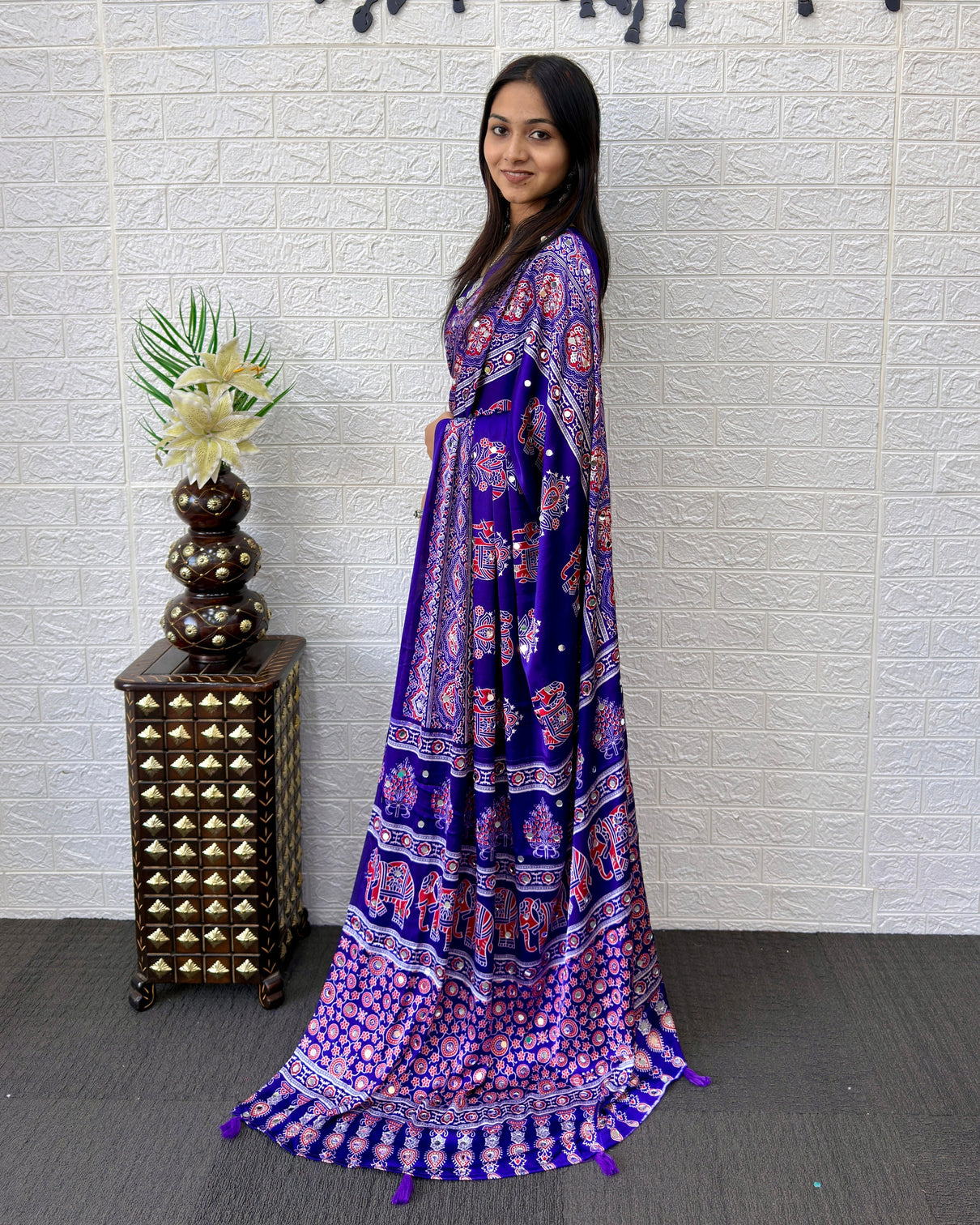 Royal purple modal silk ajrakh print saree with elephant motifs designer pallu tassels festive ethnic wear saree