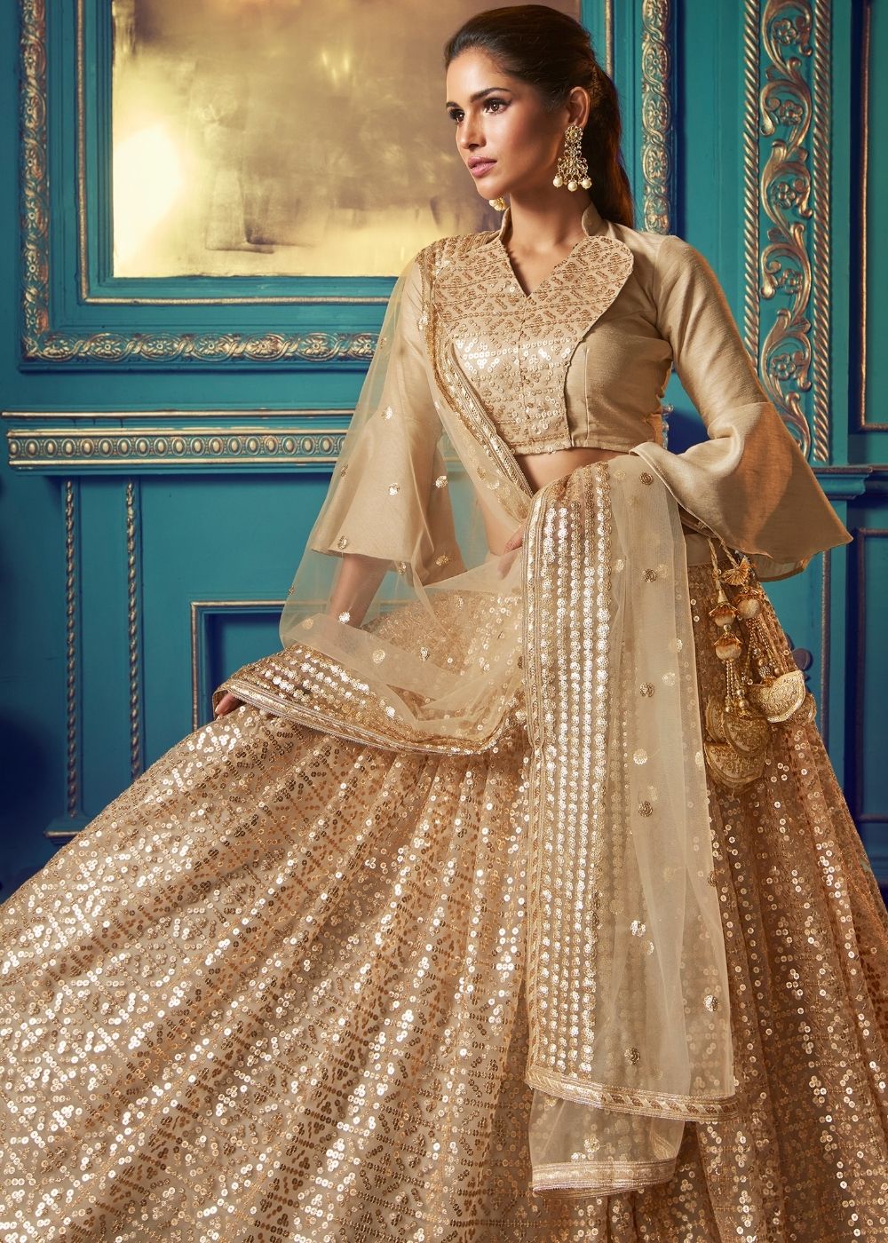 Golden Designer Soft Net Lehenga Choli with Ruffles and Sequin work