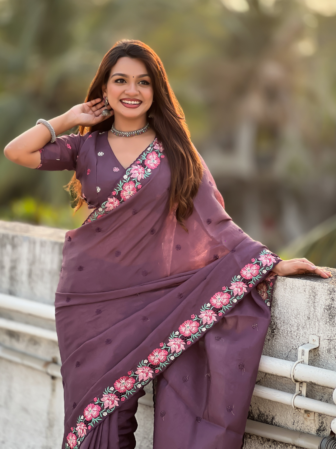 Wine pure crush embroidered saree with multicolor floral motifs and cutwork border