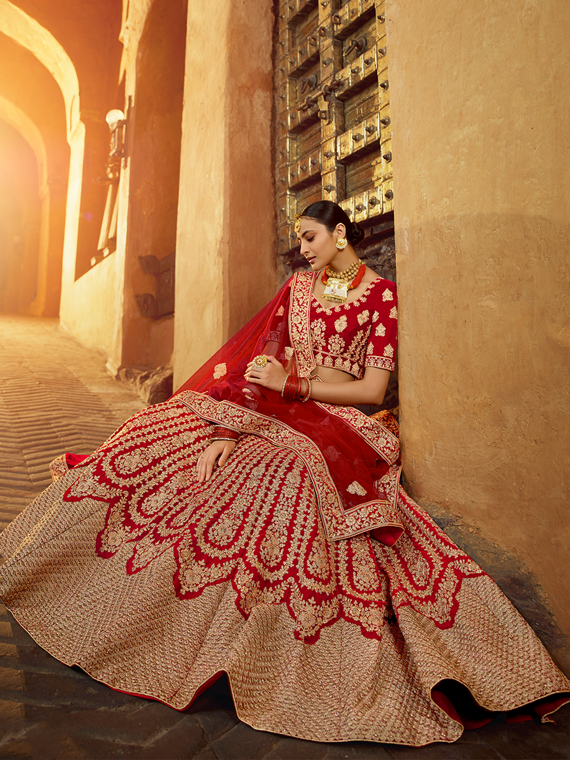 Red Embroidered Velvet Semi Stitched Lehenga With Unstitched Blouse