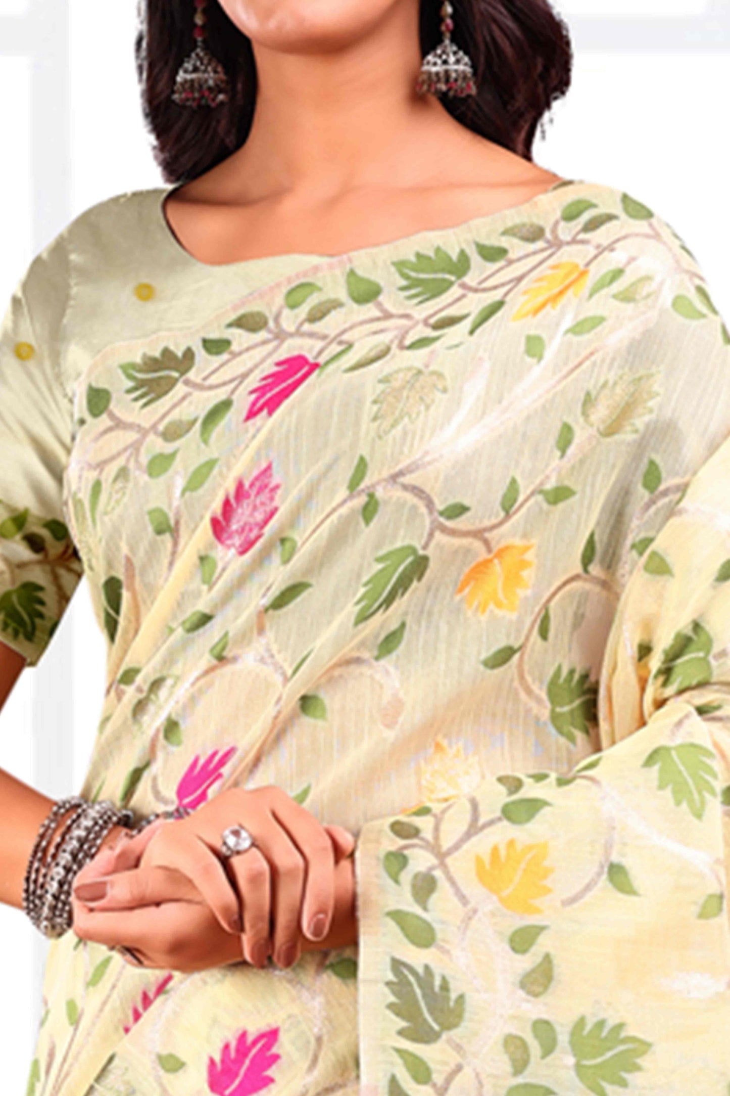 Cream Linen Cotton Silk  Saree Enhanced With Floral Zari Weaving & Tasselled Pallu Finish