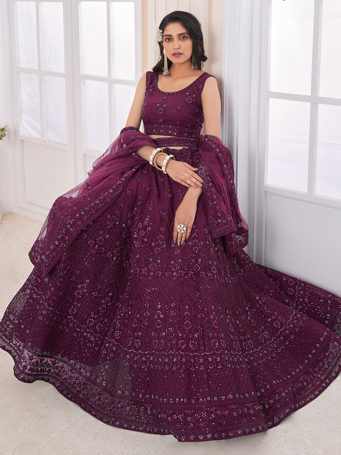 Purple Soft Net Embroidered Semi Stitched Lehenga Choli