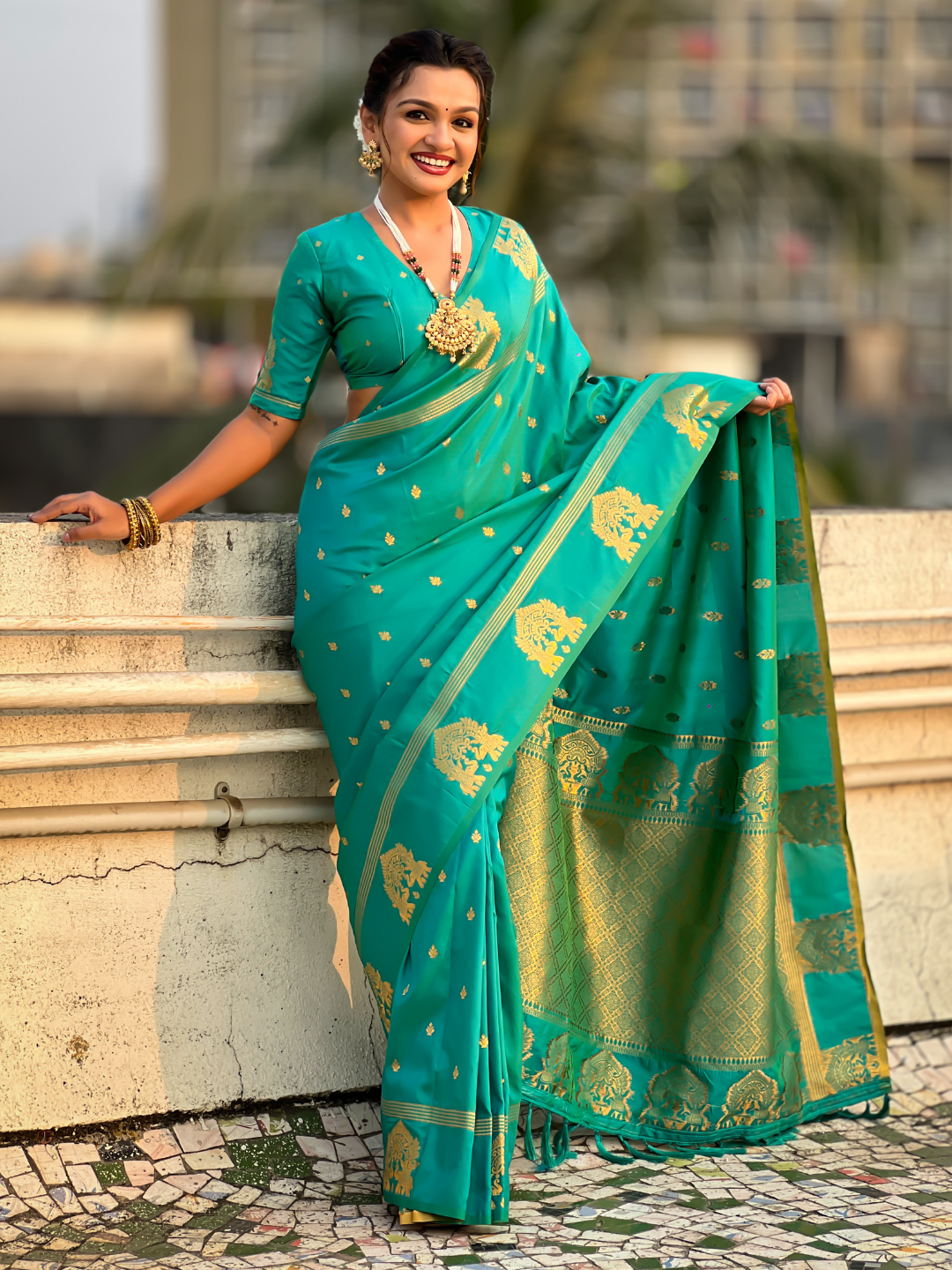 Sea green soft silk traditional zari woven saree