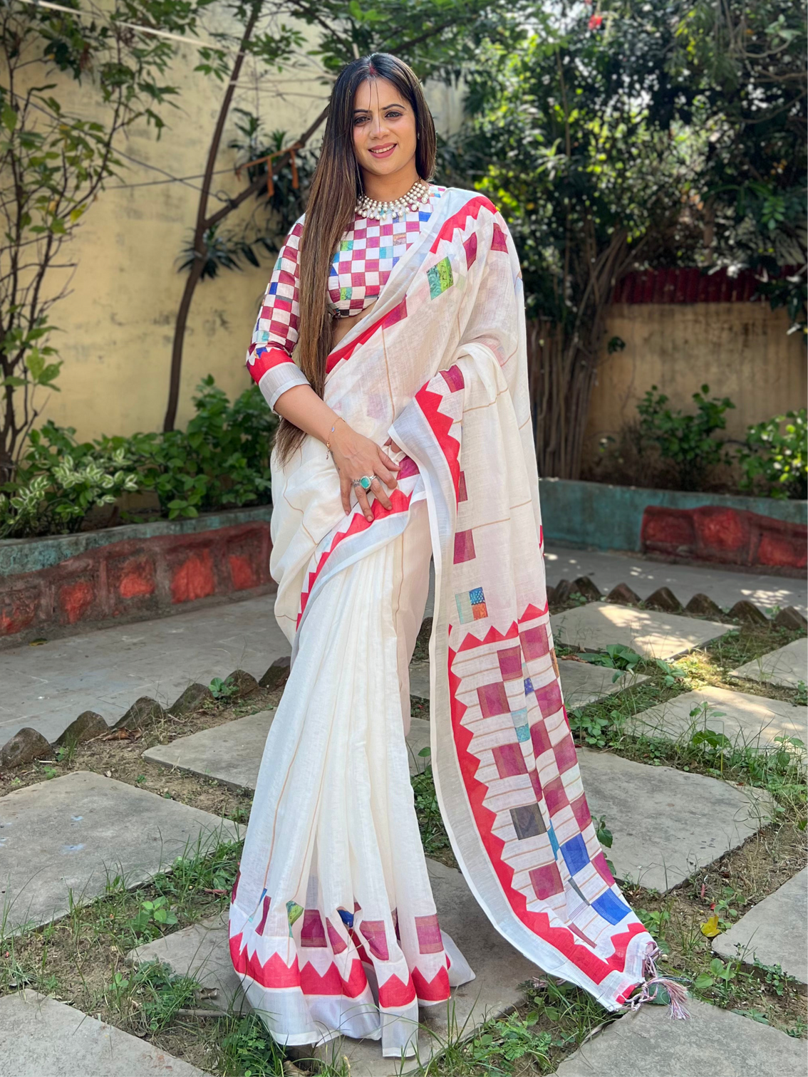 White pure cotton linen saree with multicolor checkered design blouse and tassel detailing mameraa