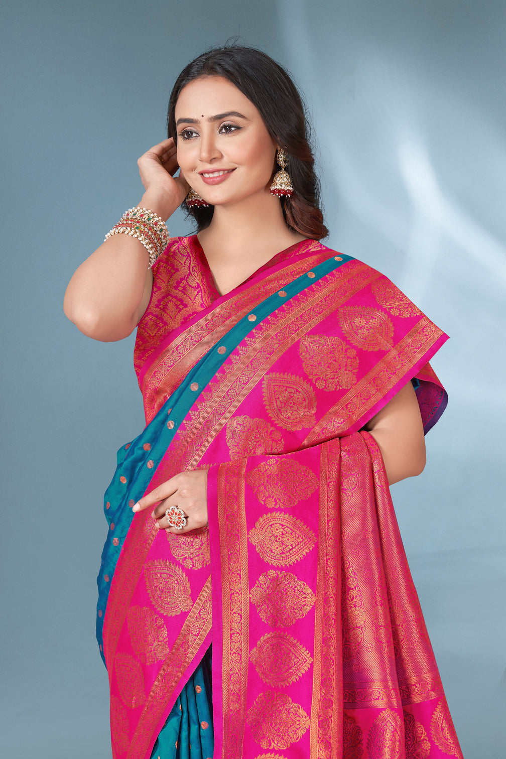 Cyan blue polka paithani silk contrast zari woven saree with unstitched blouse