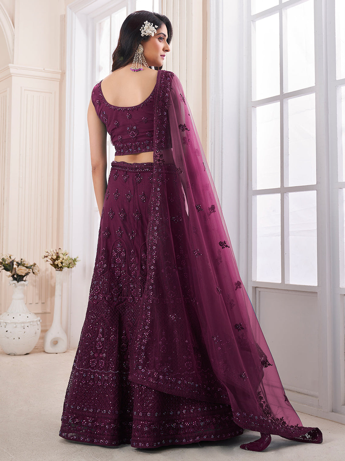 Purple Soft Net Embroidered Semi Stitched Lehenga Choli