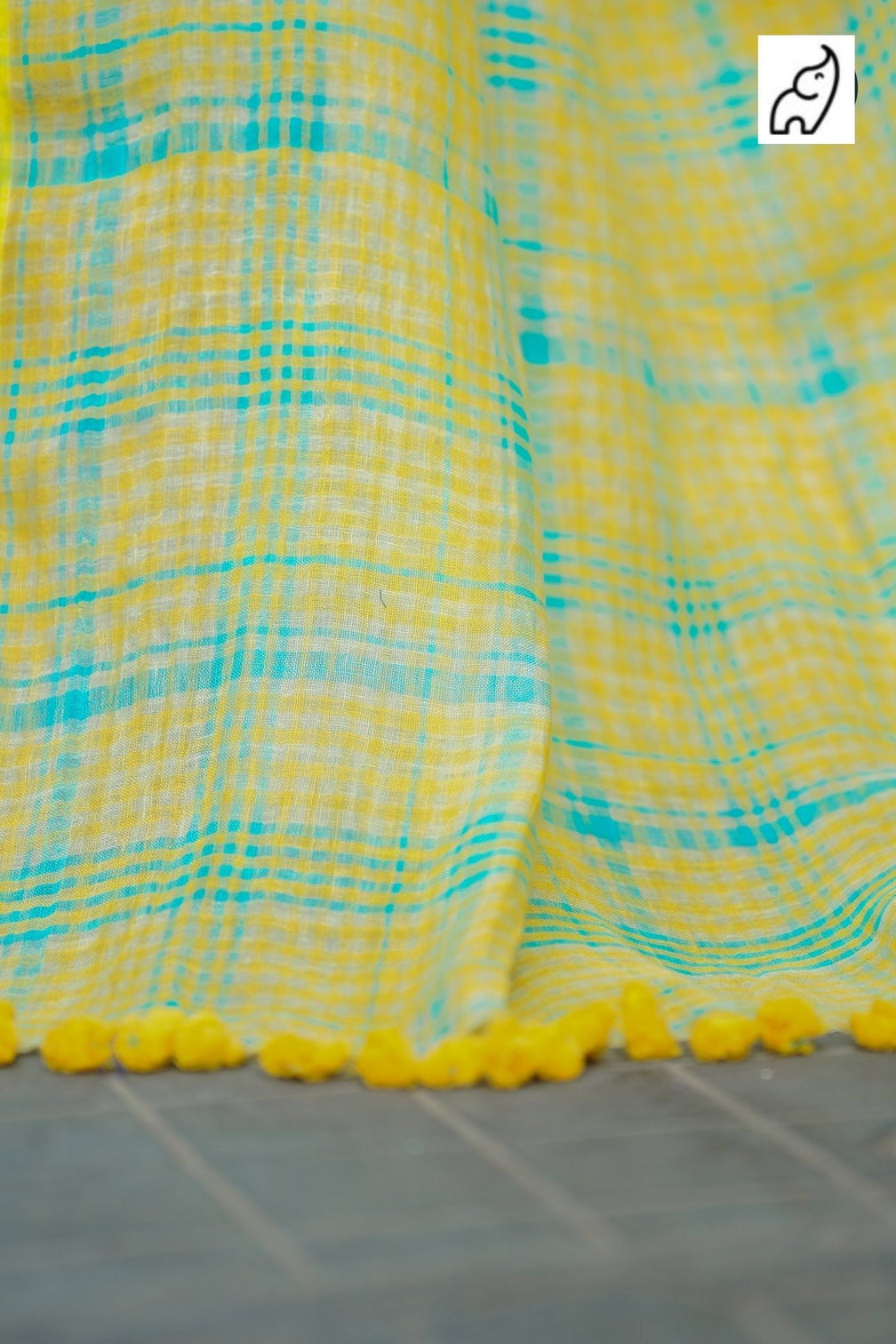 Sunshine yellow aqua blue checkered mul cotton saree with tasselled pallu includes blouse piece shree mall