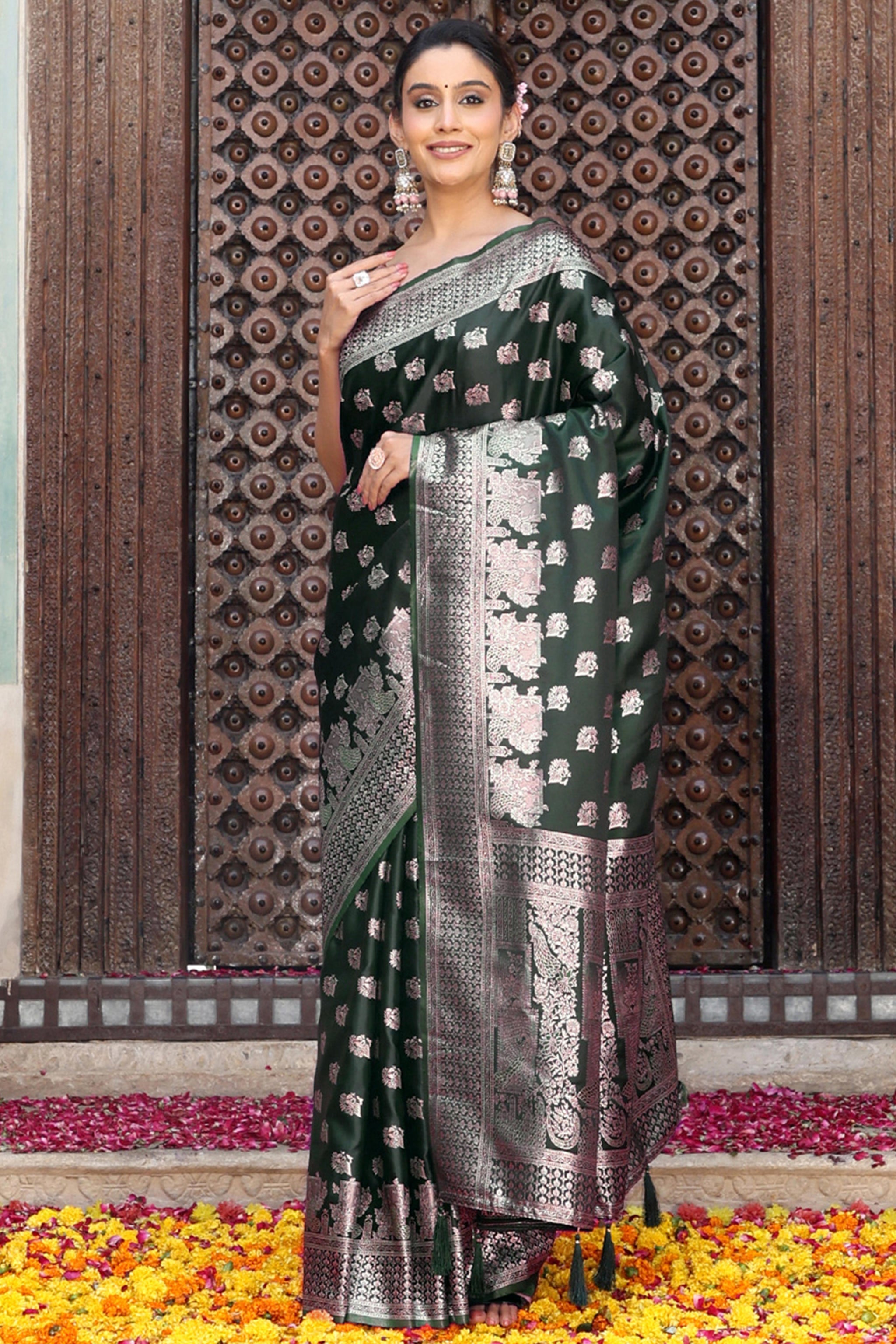 Designer Green Saree Showcasing Peacock & Floral Zari Weaving With Handmade Tassel Pallu