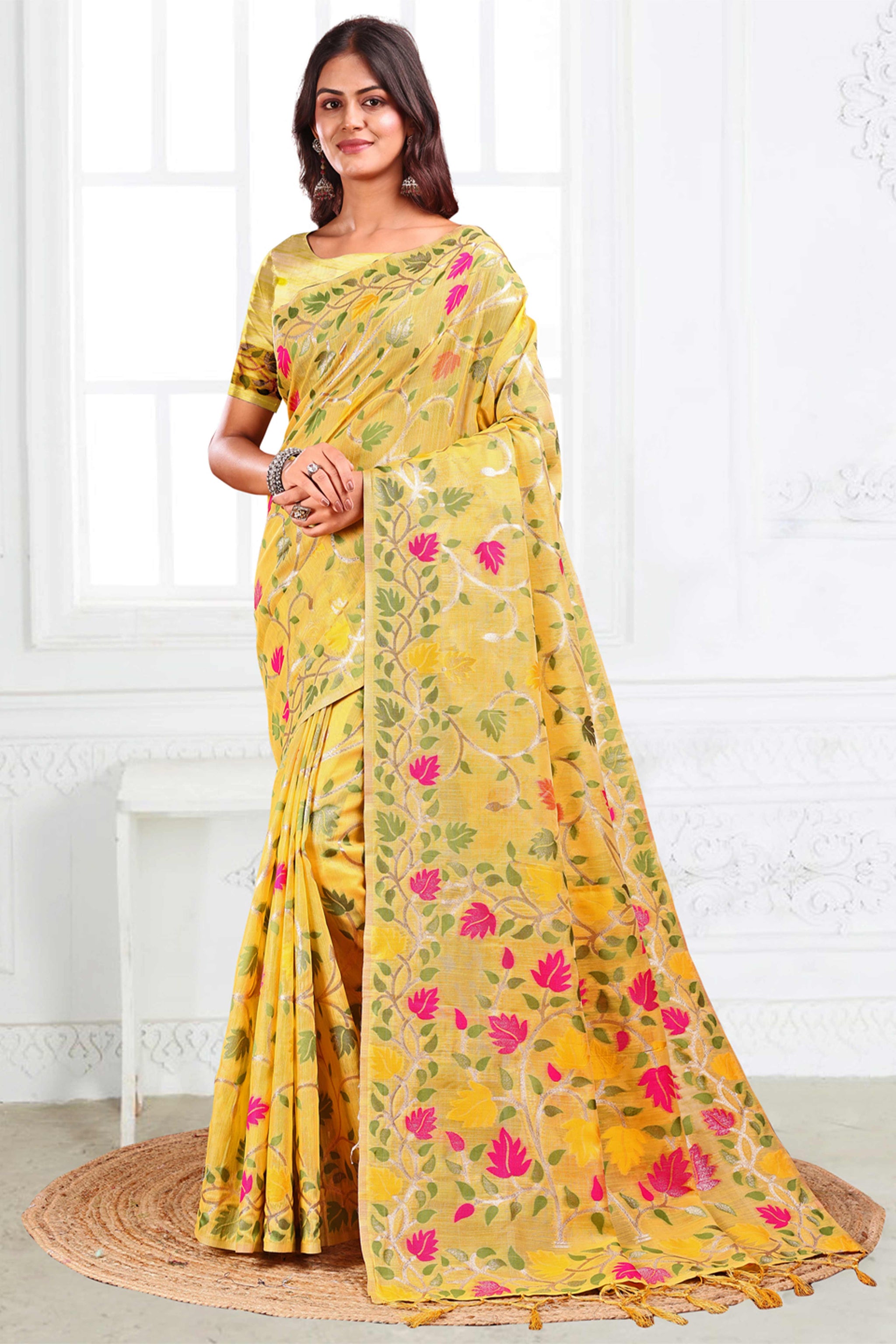 Yellow Linen Cotton Silk  Saree Enhanced With Floral Zari Weaving & Tasselled Pallu Finish