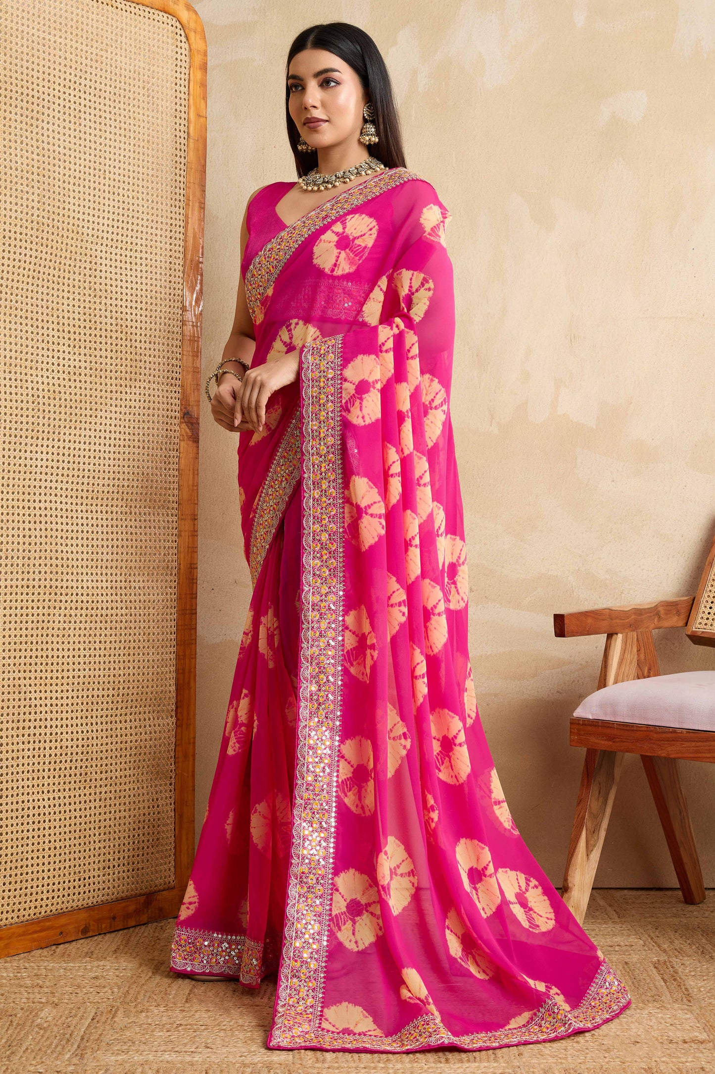 Pink Georgette Saree with Contemporary Tie-Dye Patterns and Classic Lace Work Finish