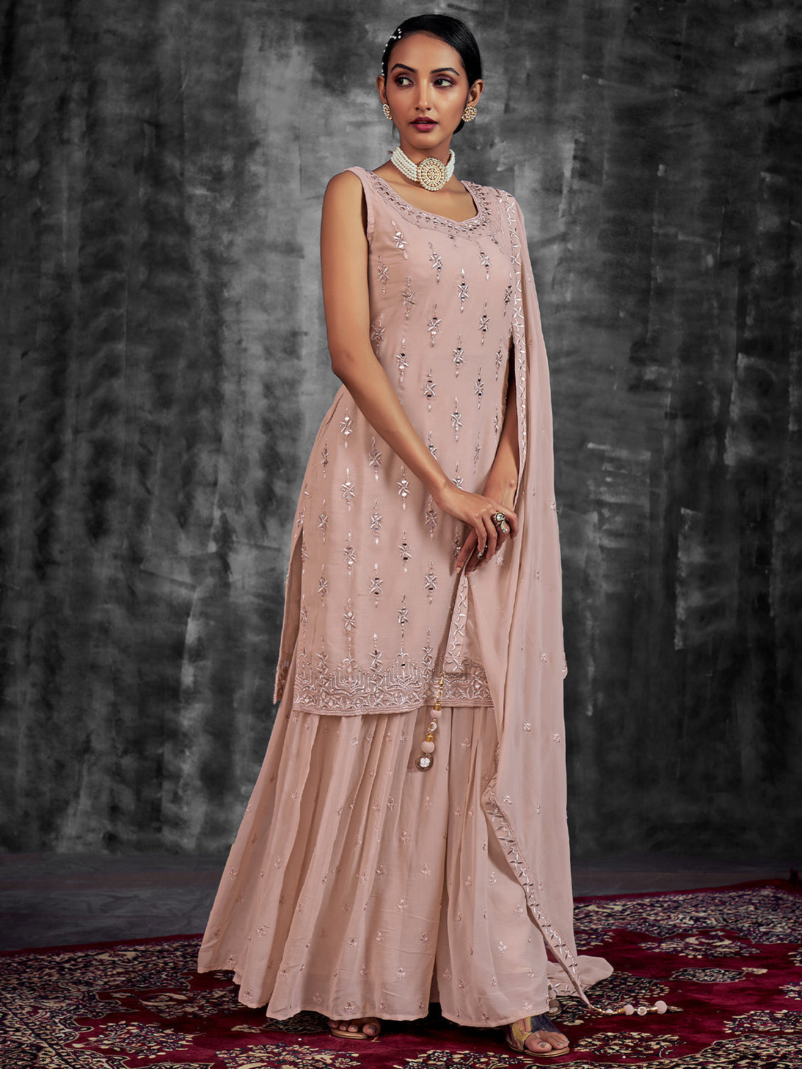Beautiful Embroidered Peach Georgette Stitched Kurta Set
