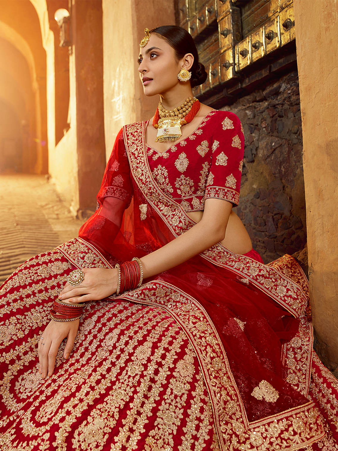 Red Embroidered Velvet Semi Stitched Lehenga With Unstitched Blouse
