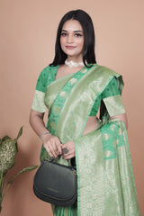Elegant Green Banarasi Silk Saree with Golden Zari Work & Tassel Border