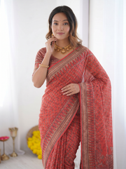 Coral red modal silk saree with traditional floral butti prints heritage border elegant ethnic designer pallu