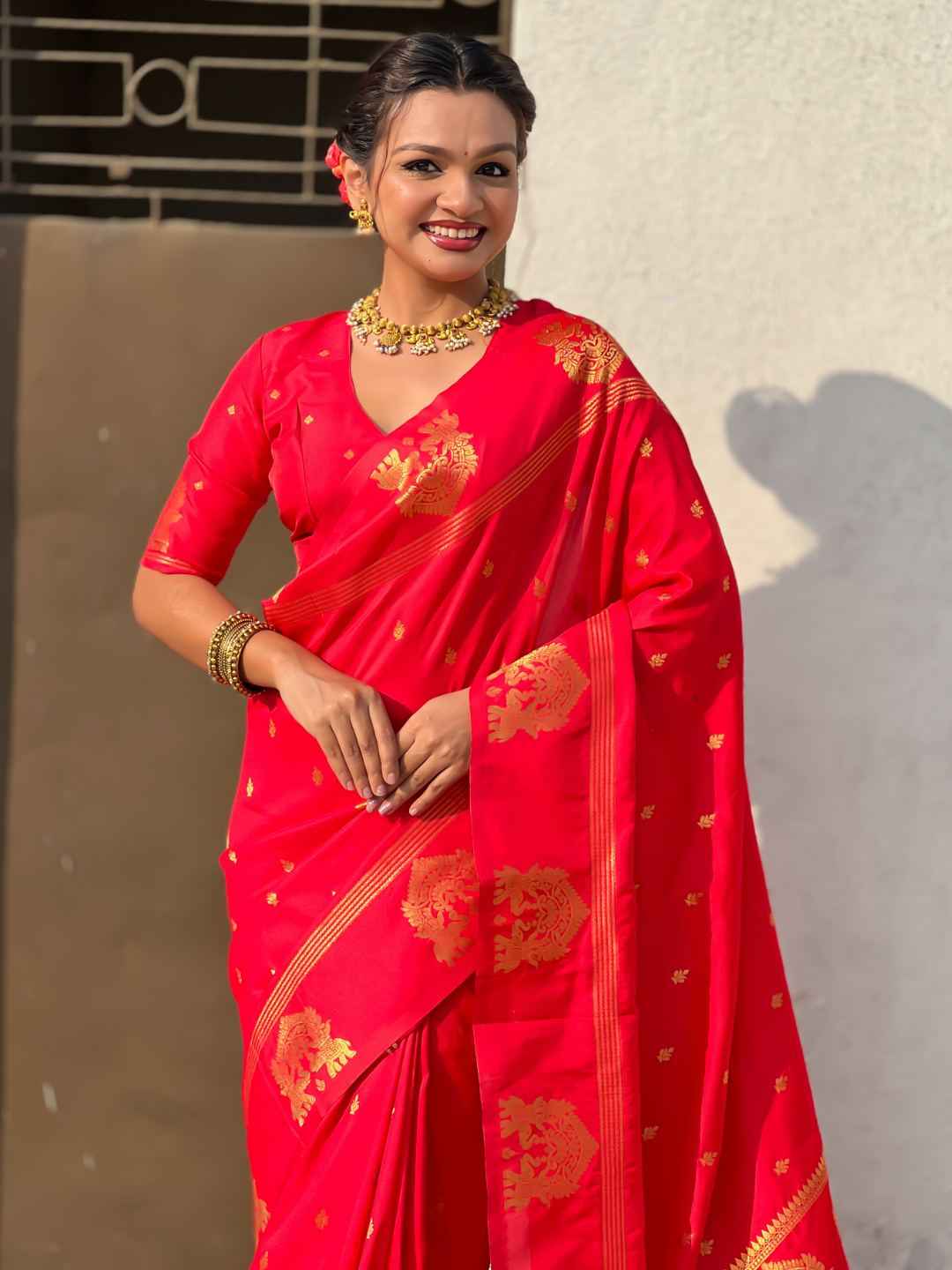 Red soft silk traditional zari woven saree